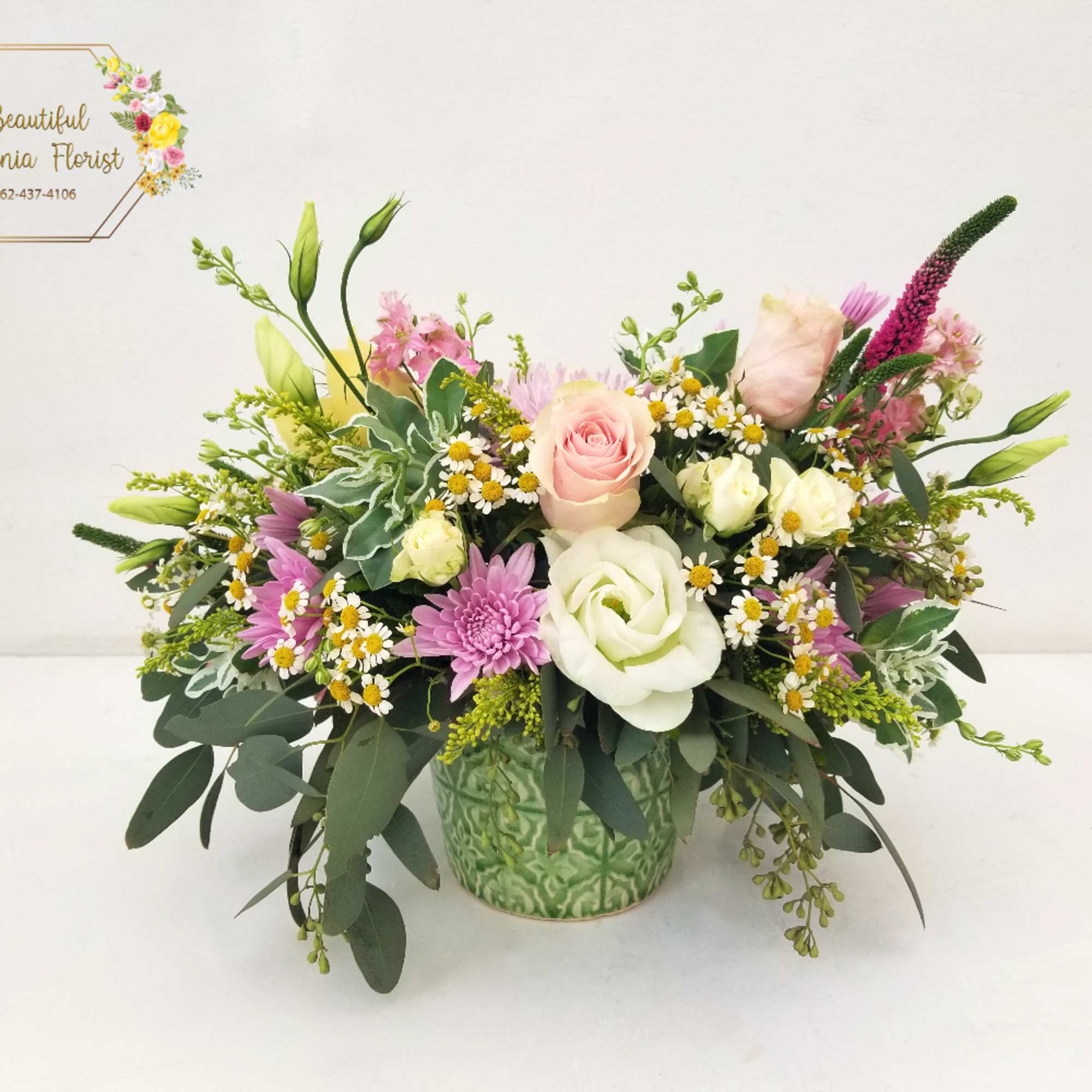 Long Beach Garden arrangement, our floral artisan selects the freshest blooms of