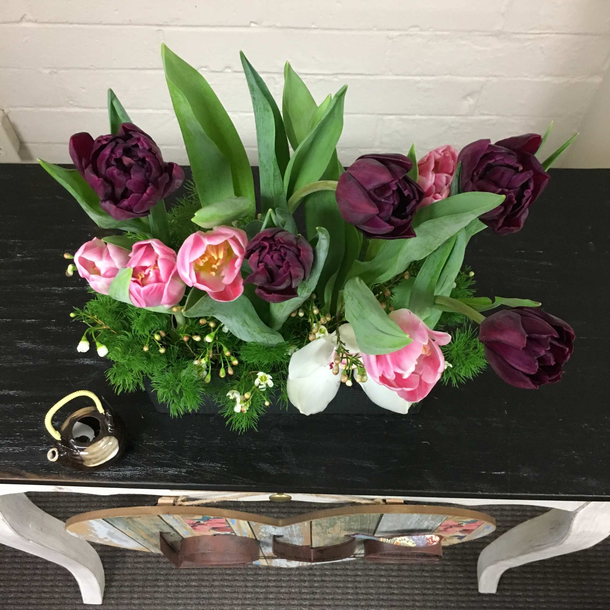 Dimensions:  14H x 10L x 3W  Elegant double petal Tulips