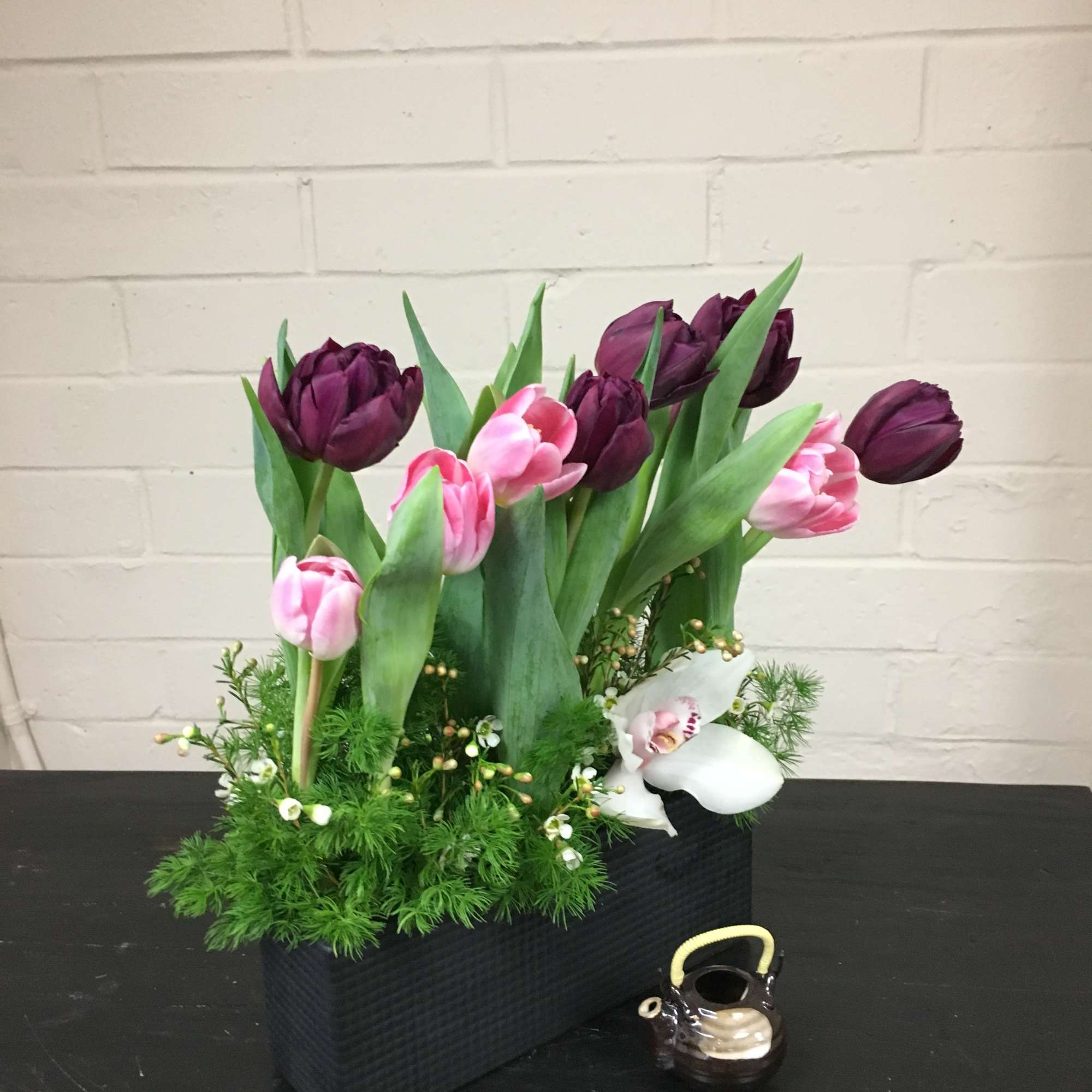 Dimensions:  14H x 10L x 3W  Elegant double petal Tulips