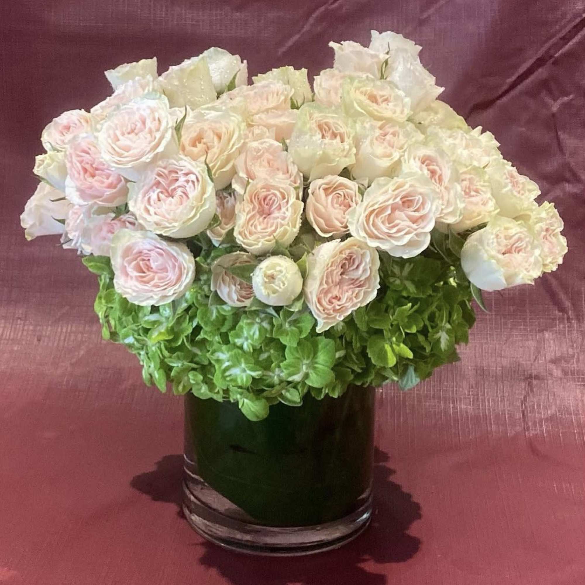 Custom arrangement of of hydrangeas &amp; pale pink spray roses 