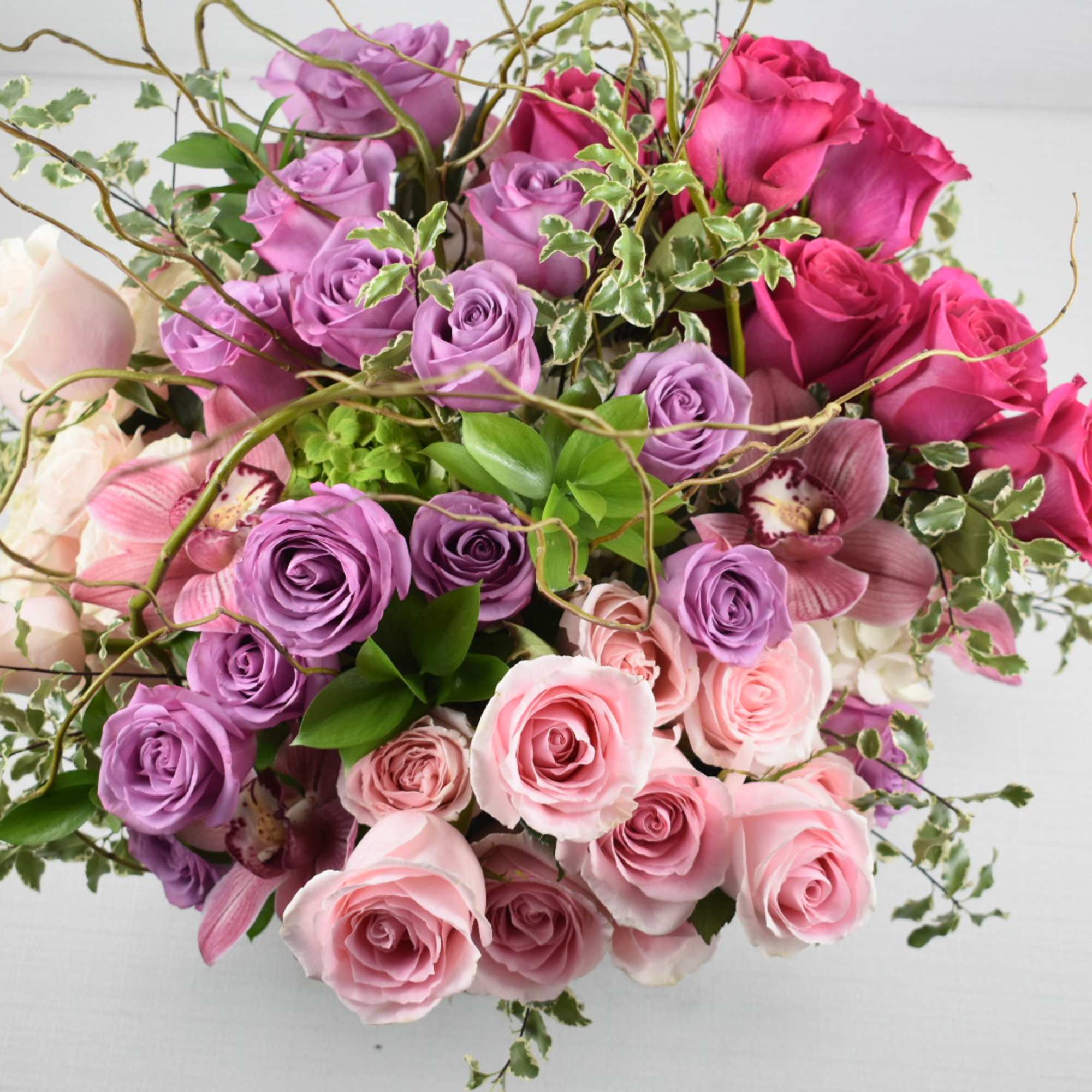 This unique Sebas Flowers design is perfectly arranged in a low silver