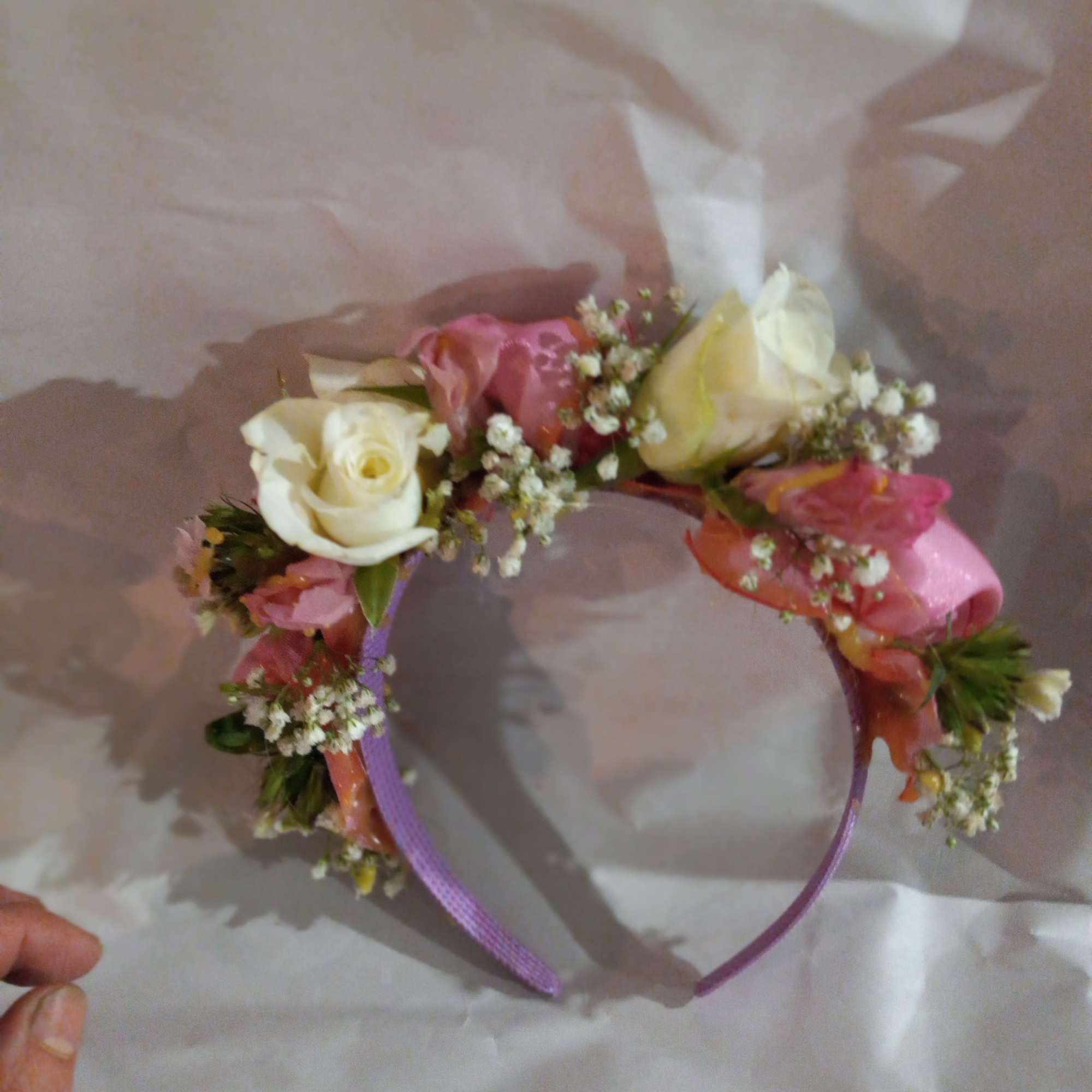 Floral crown makes bride or flower girl look royal by fare.