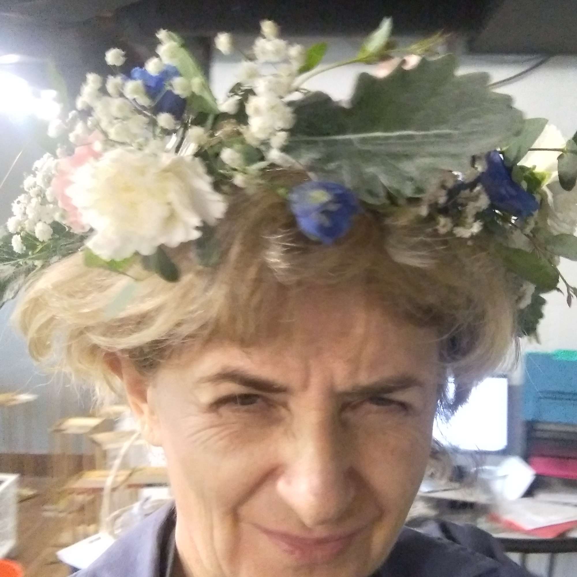 Floral crown makes bride or flower girl look royal by fare.