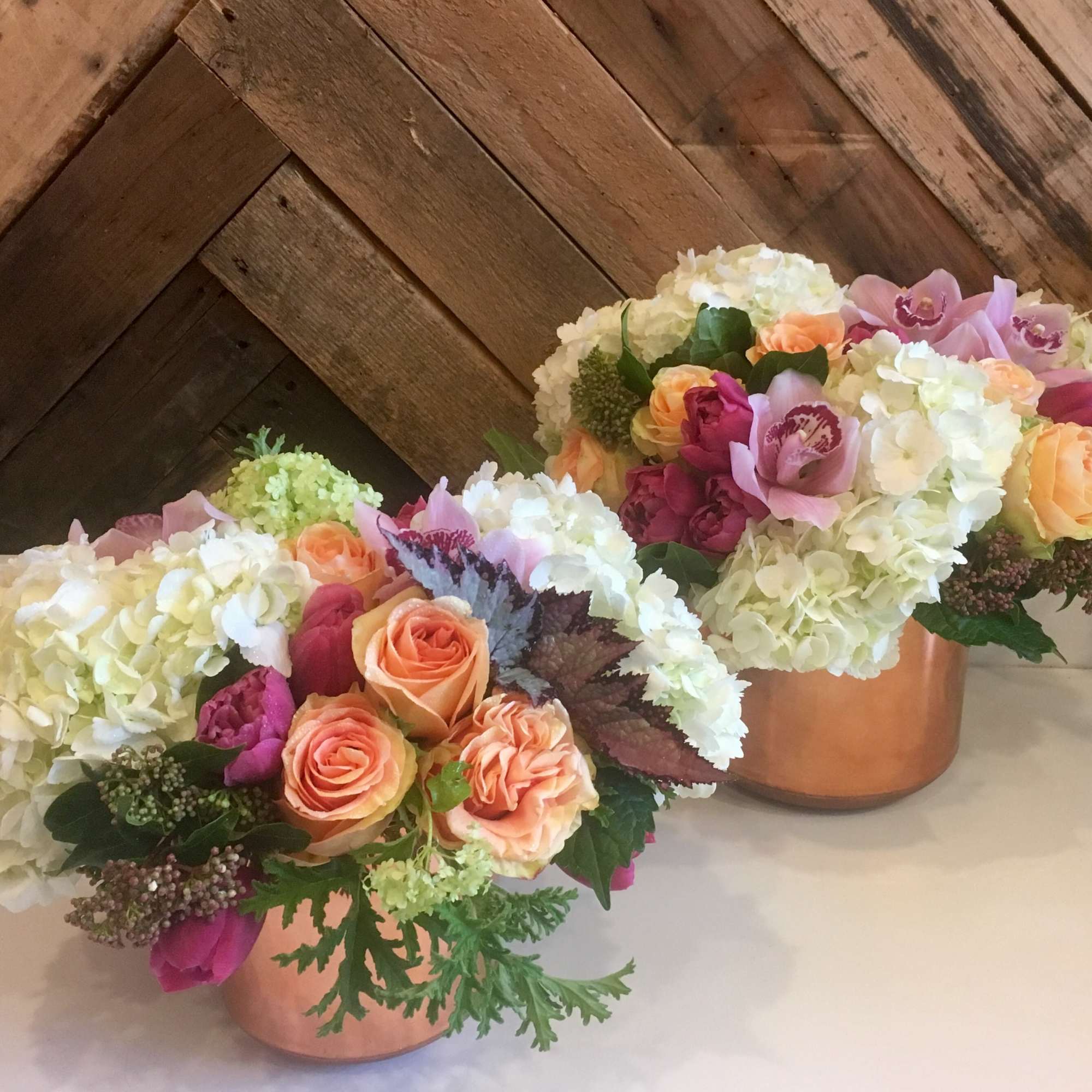 Our Designer's Choice Seasonal Pastel (Spring) arrangement is soft and sweet. We Our Designer's Choice Seasonal Pastel (Spring) arrangement is soft and sweet. We