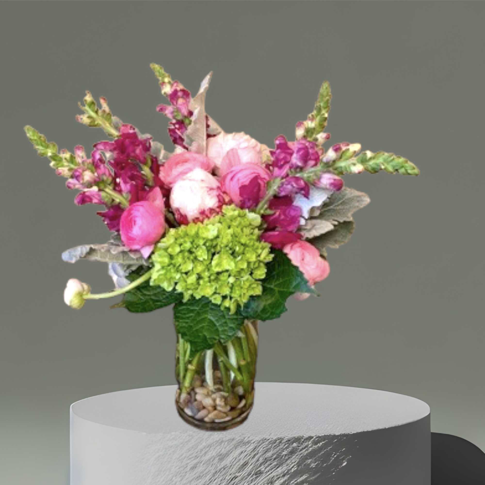 A pretty selection of pink and purple Spring flowers including Snap Dragon