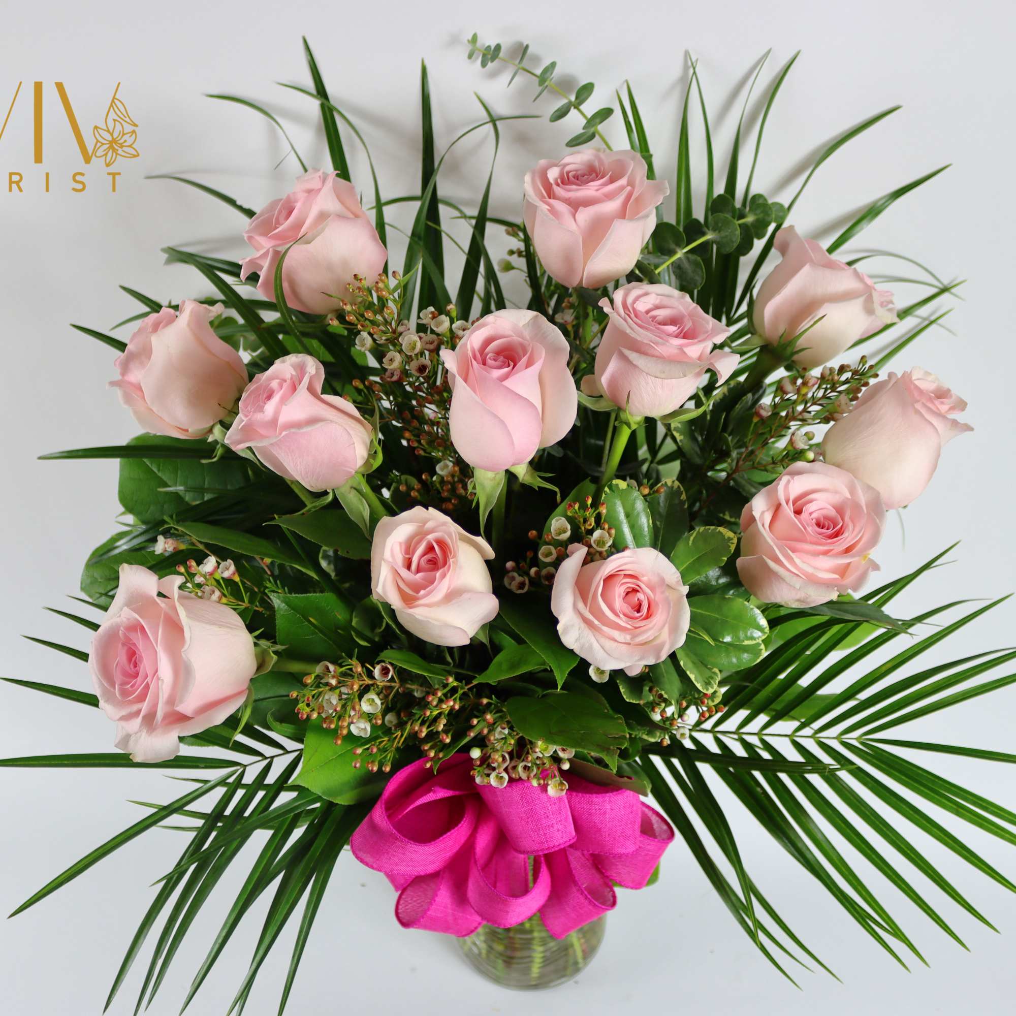 Send love with one dozen premium pink roses or any color roses