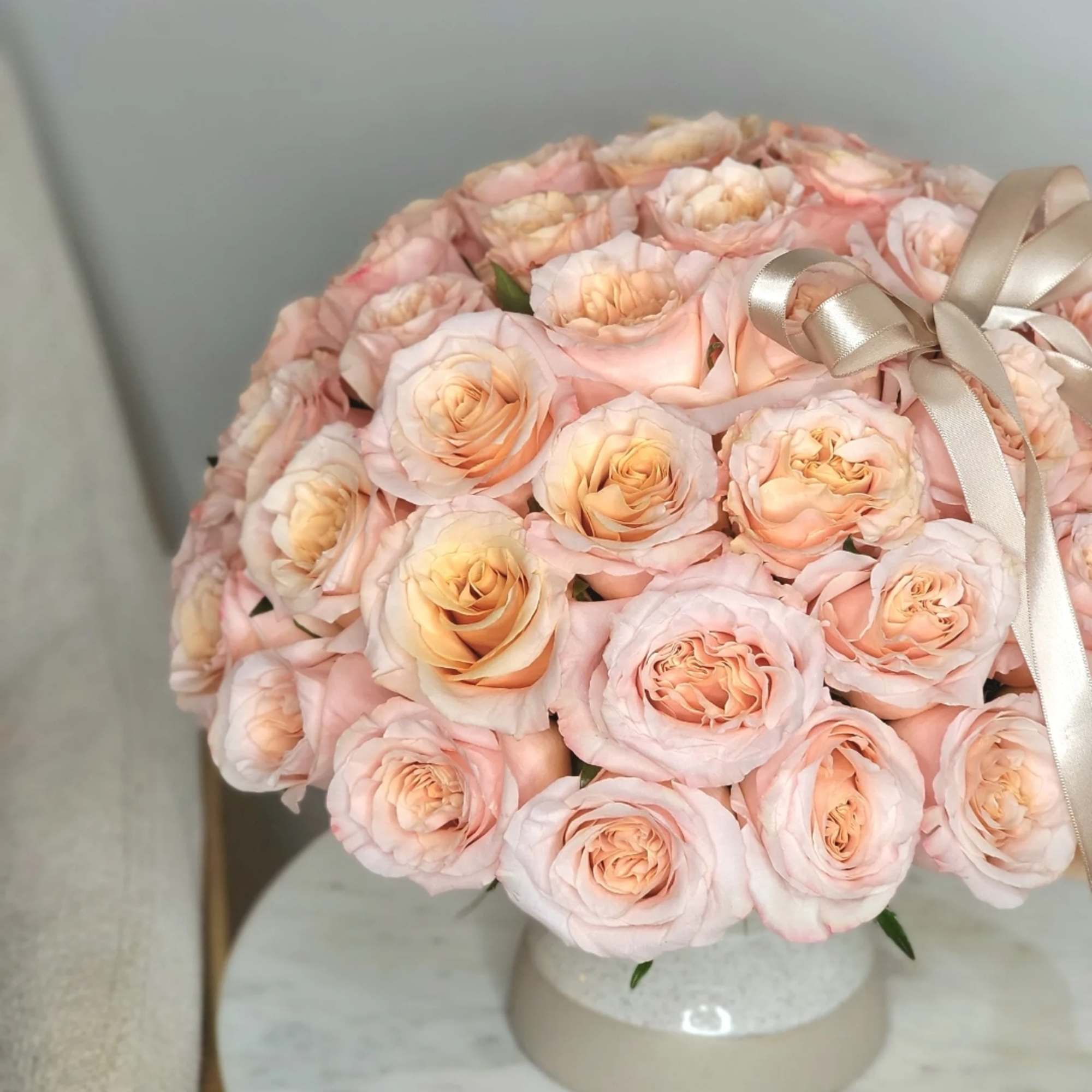Peach roses are flowers of delicate and warm pink&ndash;orange colors, having an