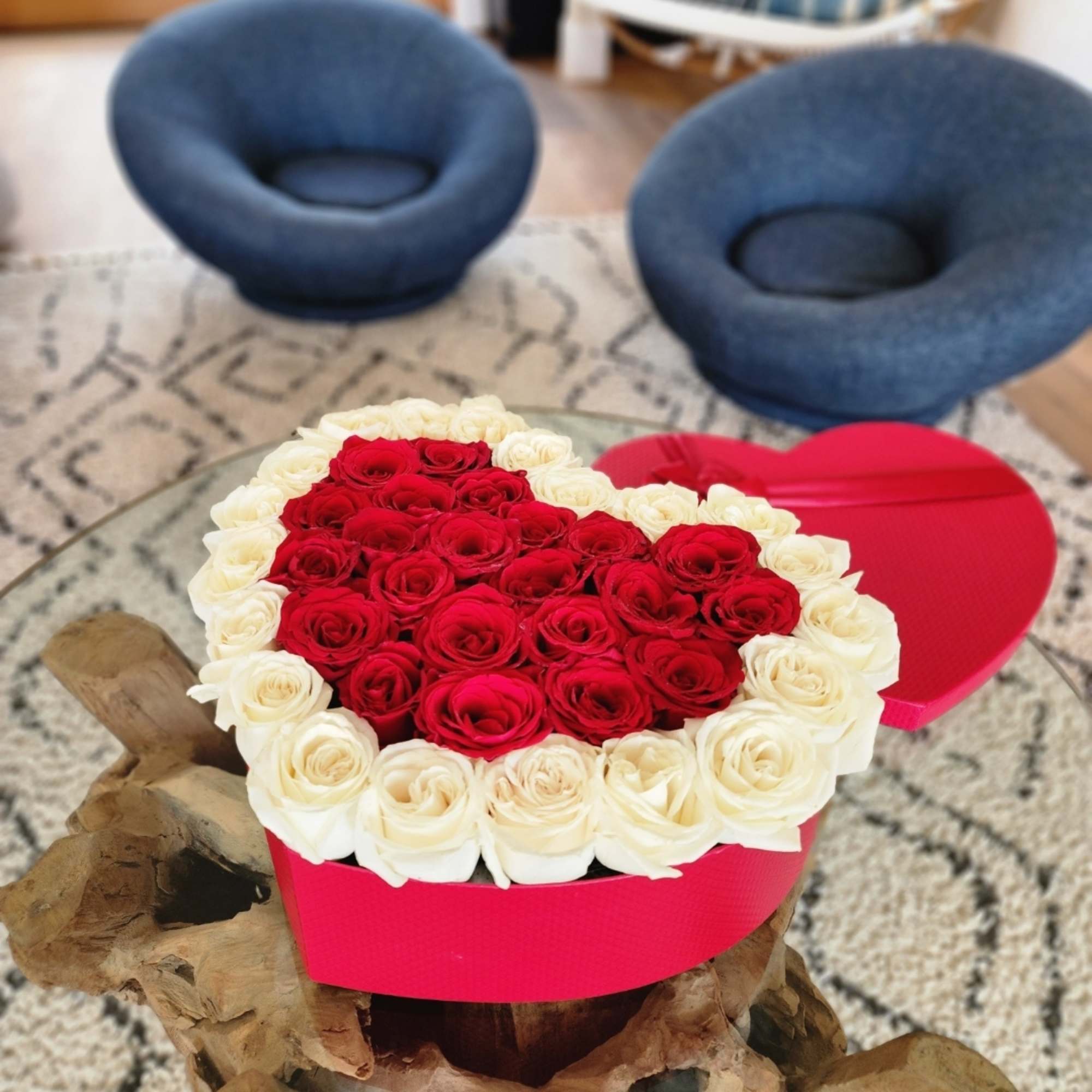 Flowers in a box is a romantic gift for any celebration. Such