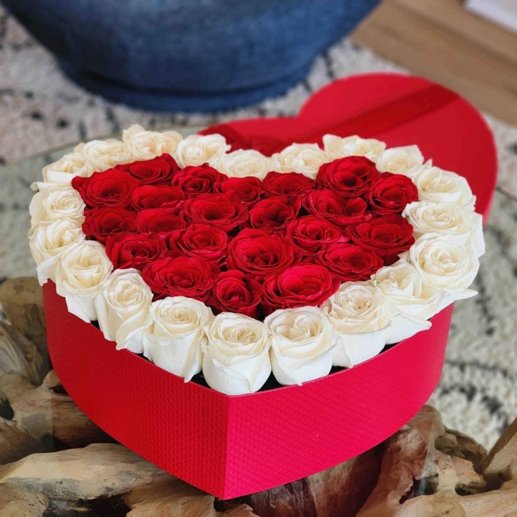 Flowers in a box is a romantic gift for any celebration. Such