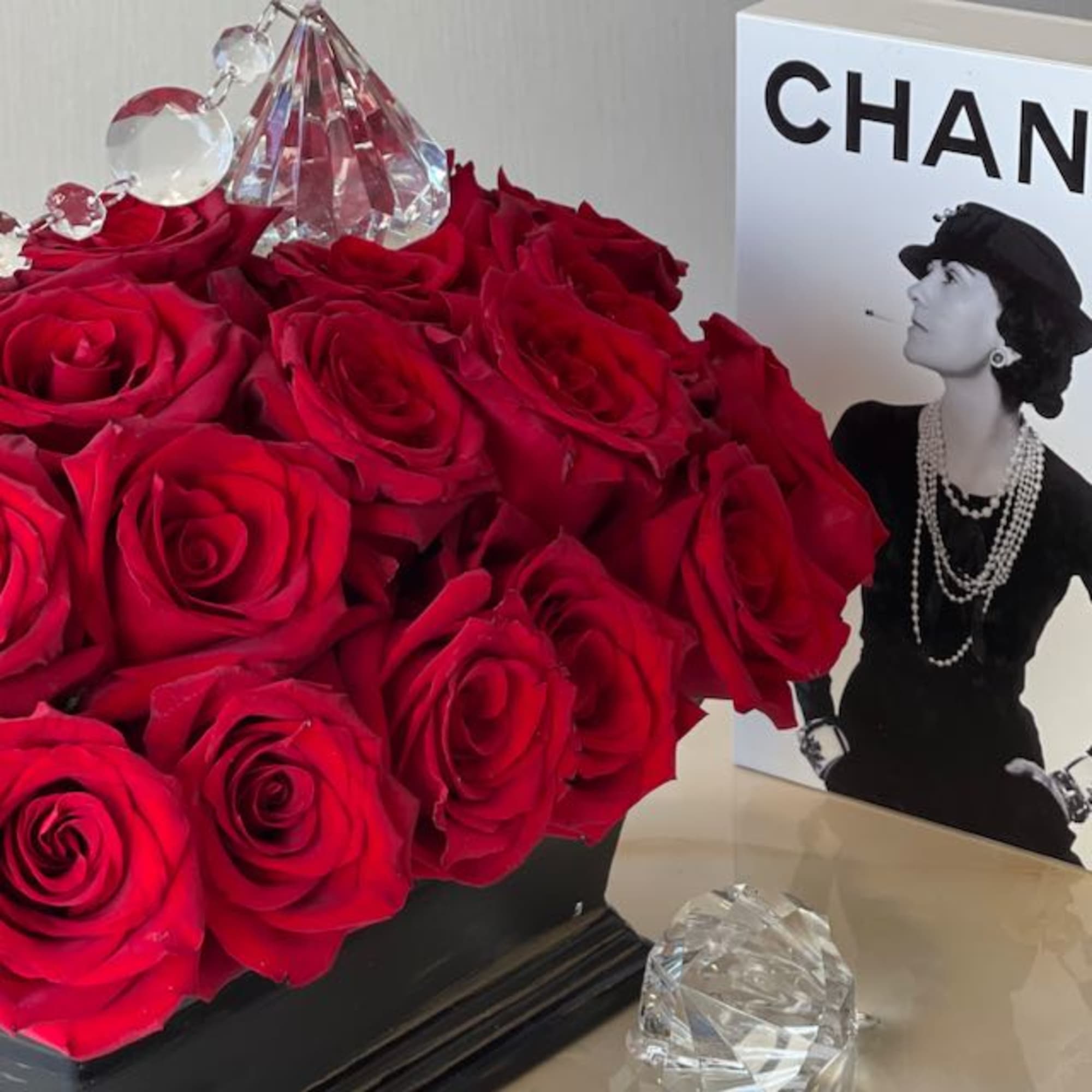 Nothing express love like a beautiful red rose arrangement. This stunning arrangement