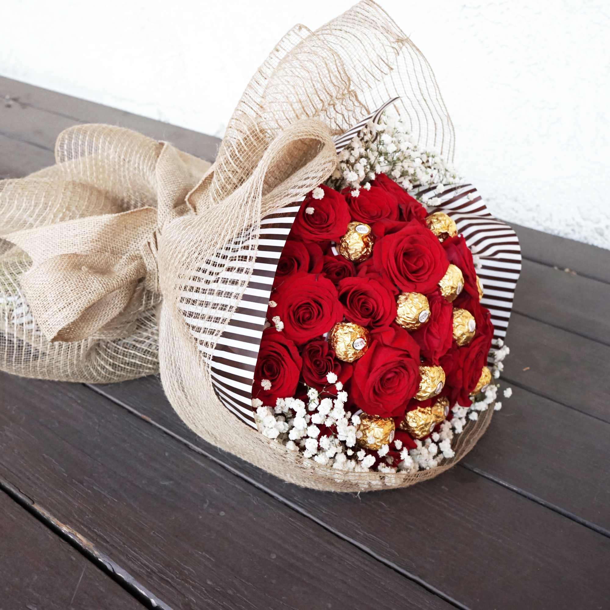 2 Dozen Premium Red Roses wrapped in rustic burlap for a vintage