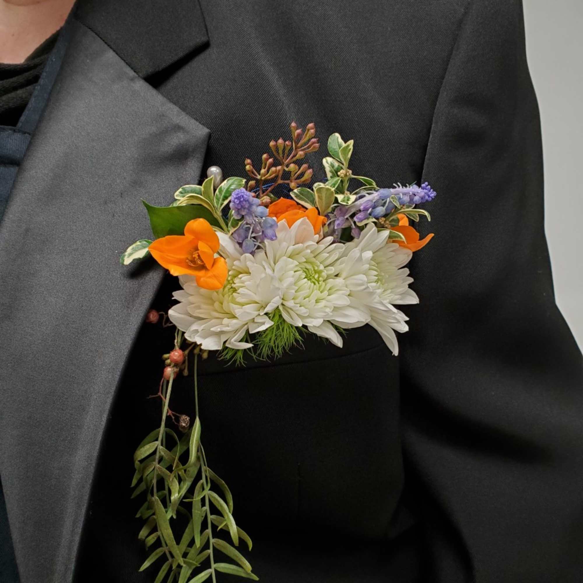 This boutonniere will be made out form wrapped in ribbon to match