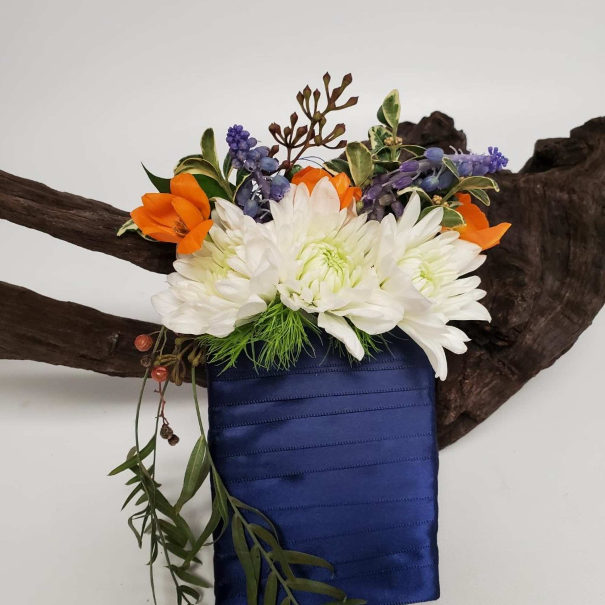 This boutonniere will be made out form wrapped in ribbon to match