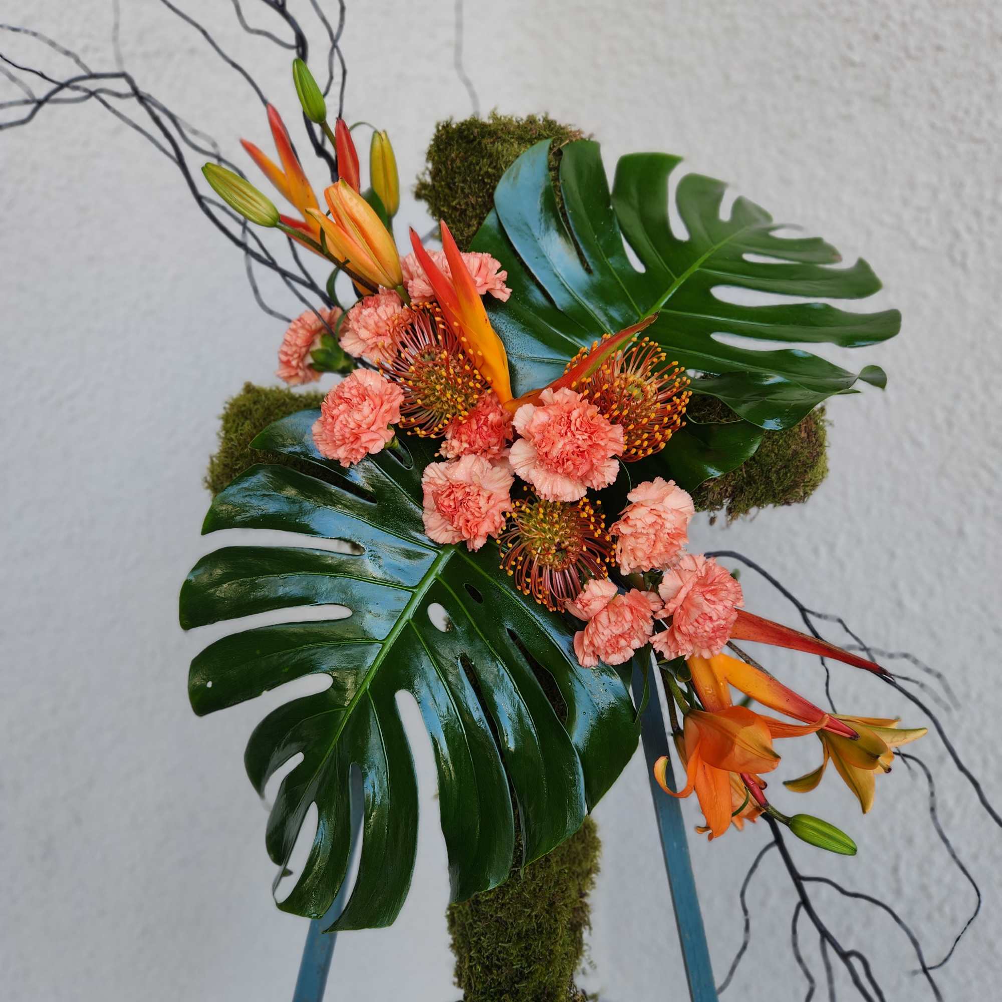 A cross made with moss 