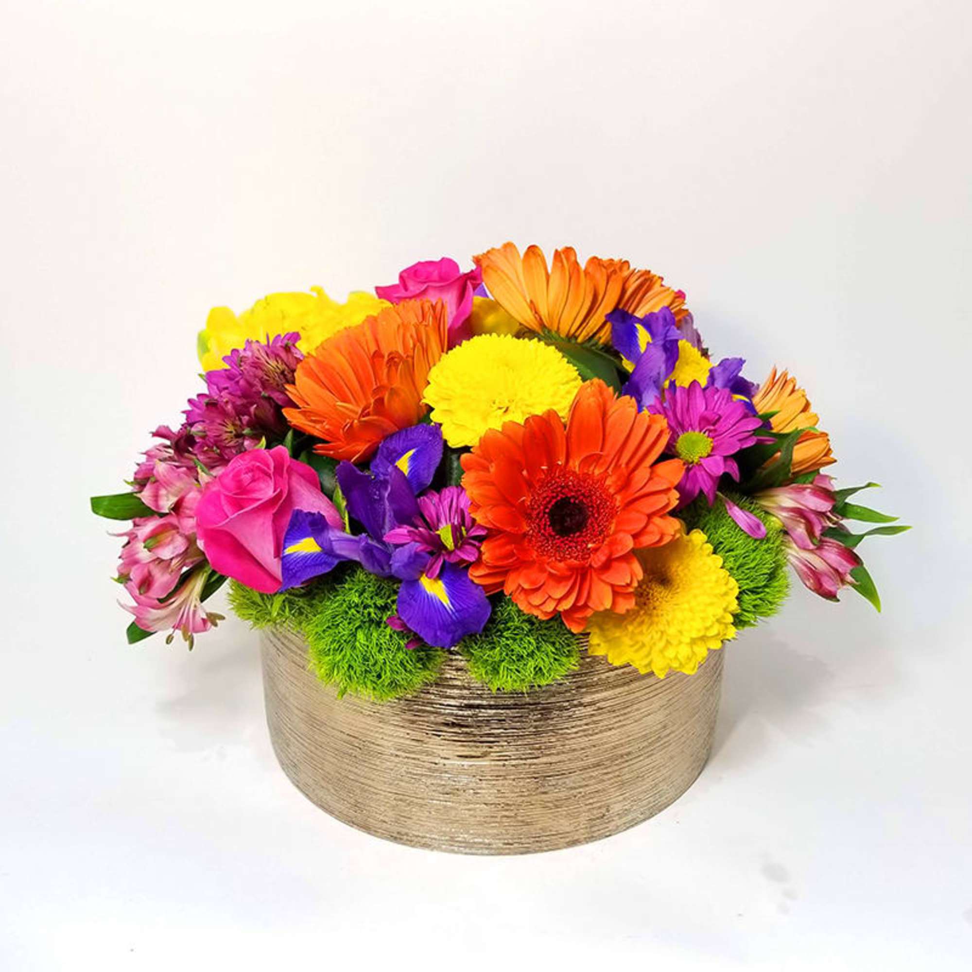 Spring Spirit for Her. Arrangement of colorful Gerber&#039;s, roses, bottoms, and other