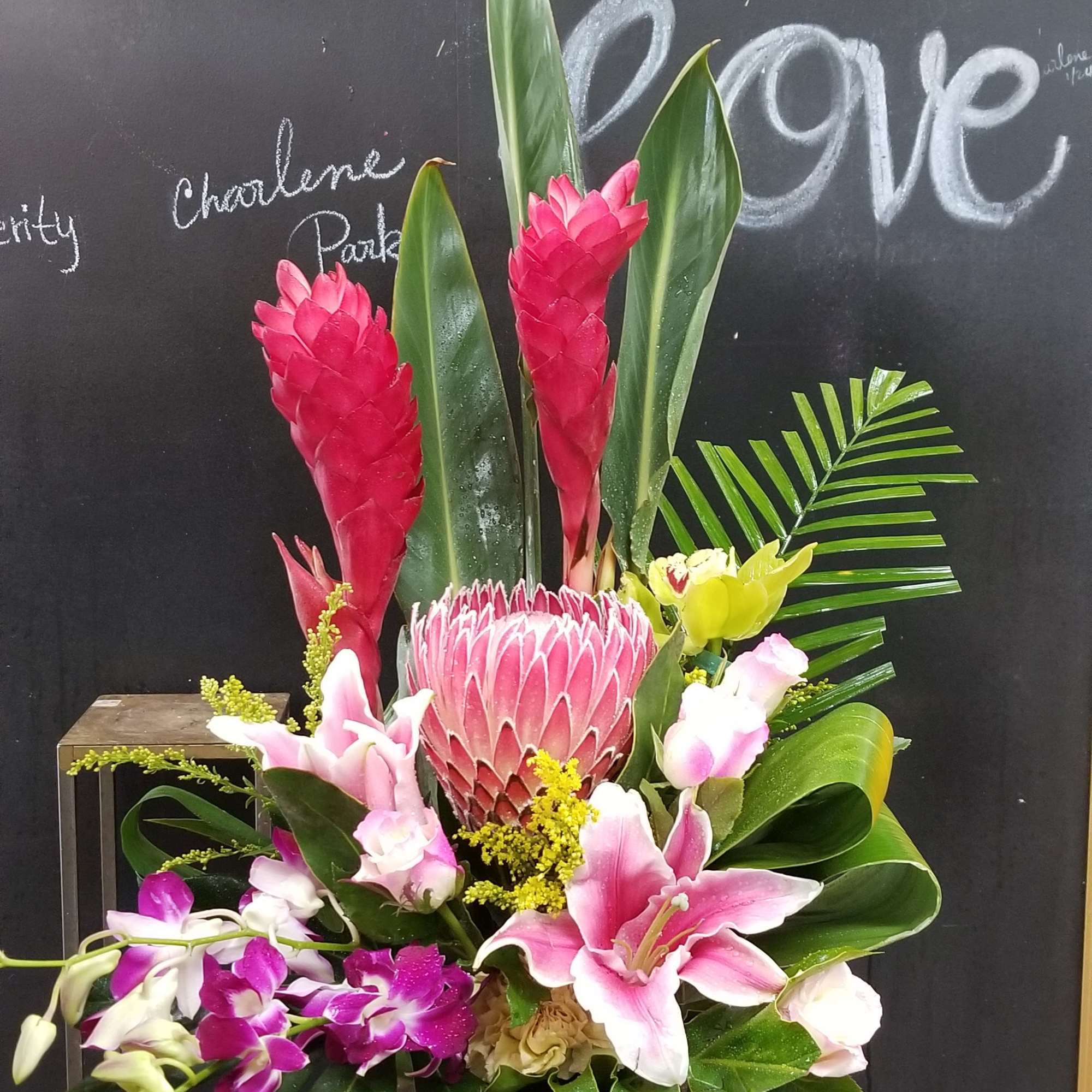 This Hawaiian hugs and kisses Arrangement including tropical flowers like ginger, protea