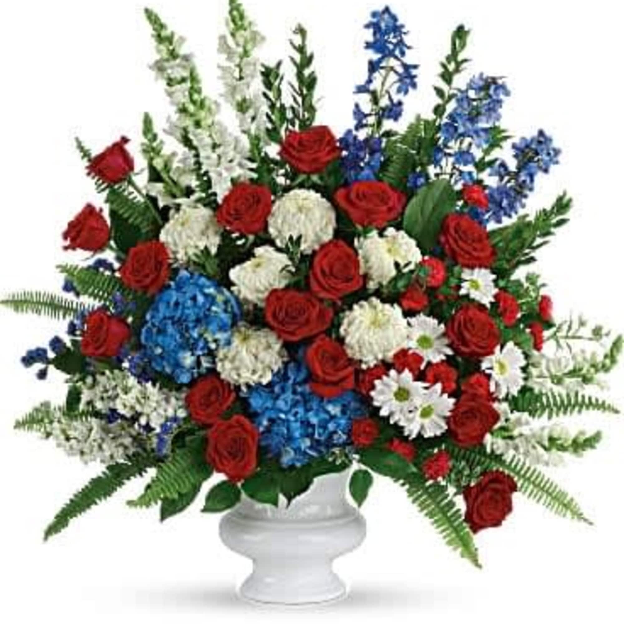 A dazzling display of patriotic red, white and blue flowers sends a A dazzling display of patriotic red, white and blue flowers sends a