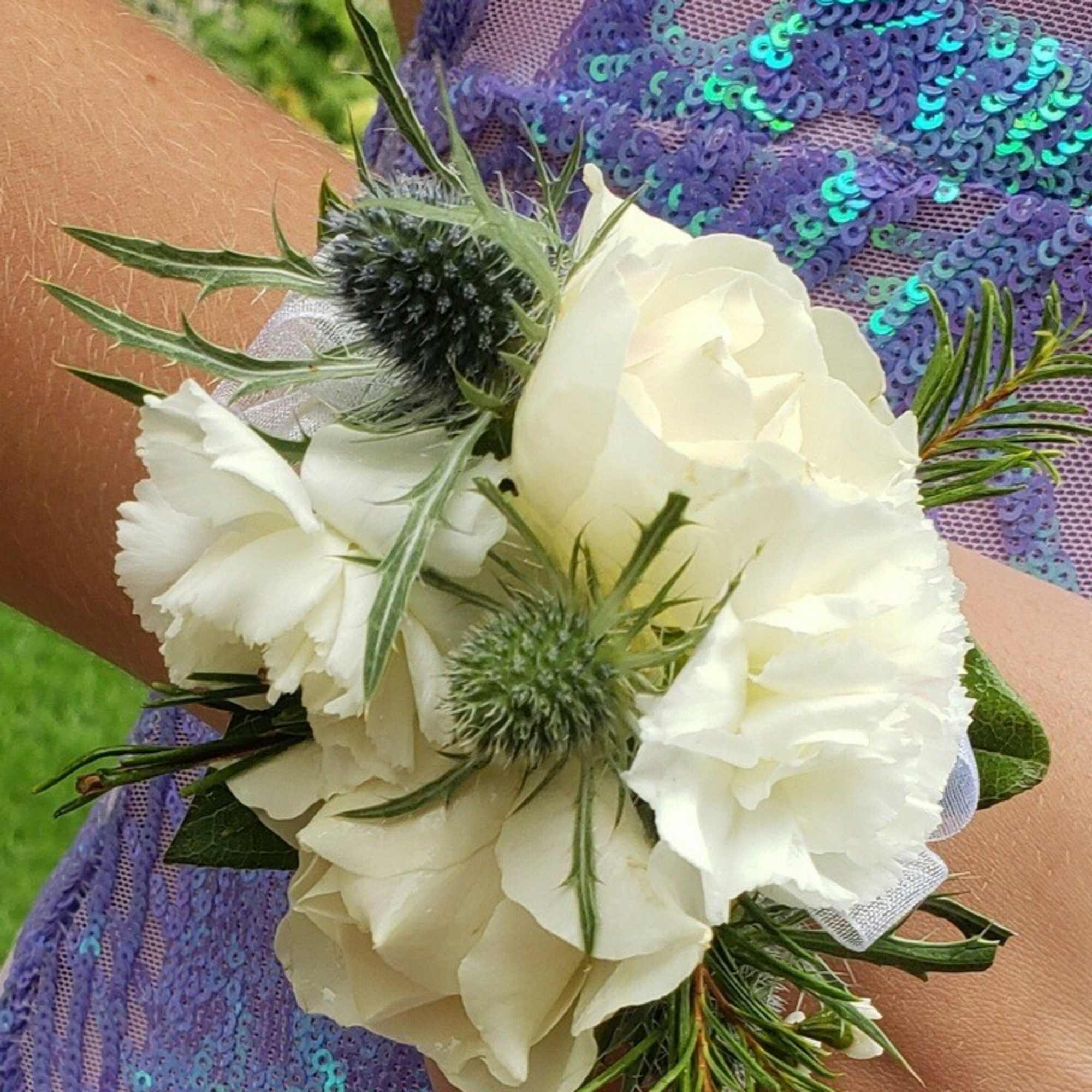 I will make your corsage and boutonniere to your choice of colors.