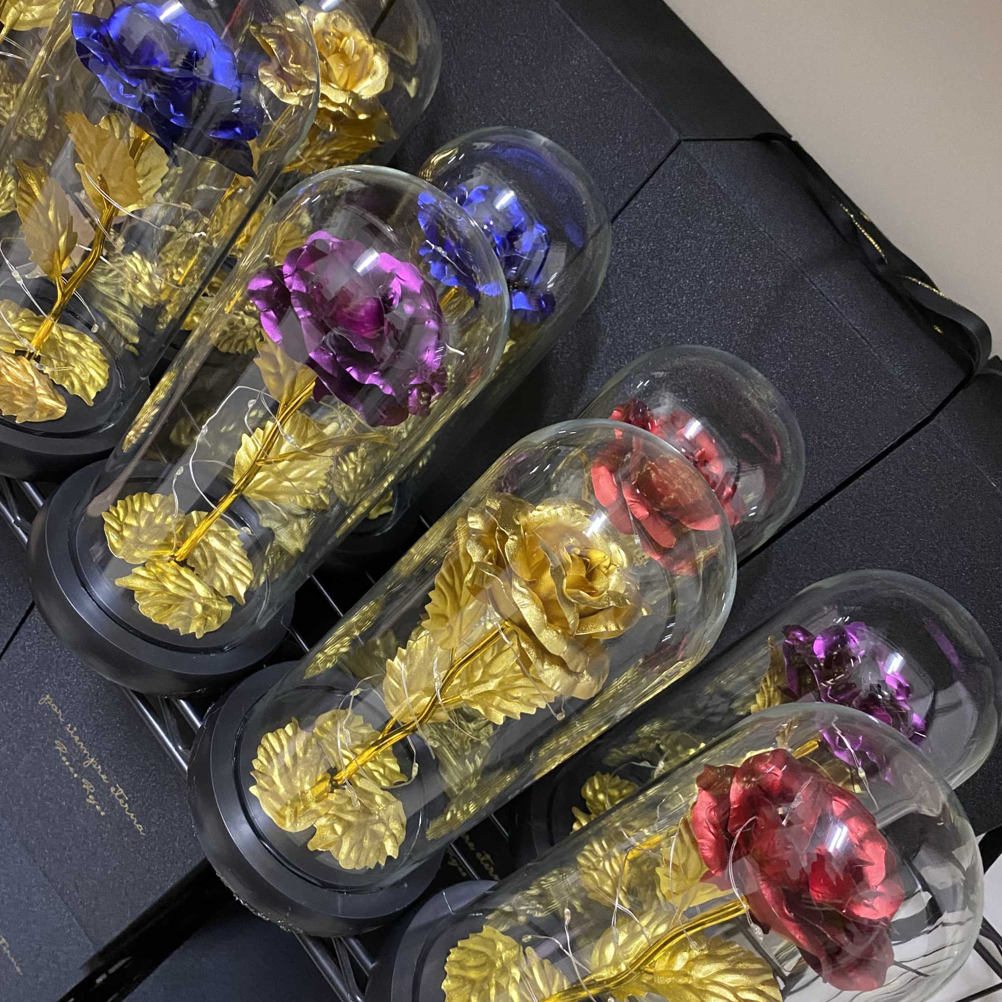 Beautiful artificial roses that are wrapped around LED lights in your choice