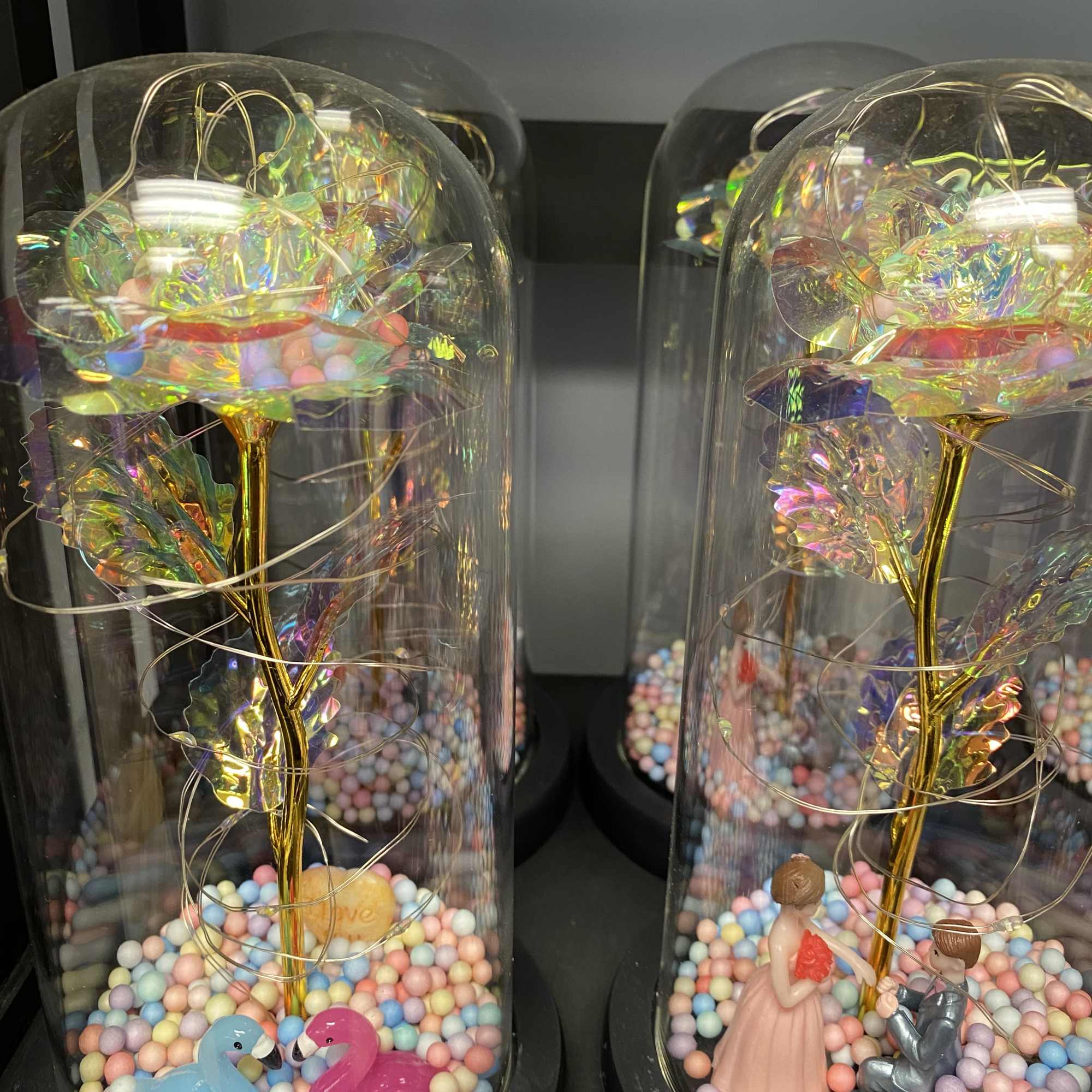 Beautiful artificial roses that are wrapped around LED lights in your choice