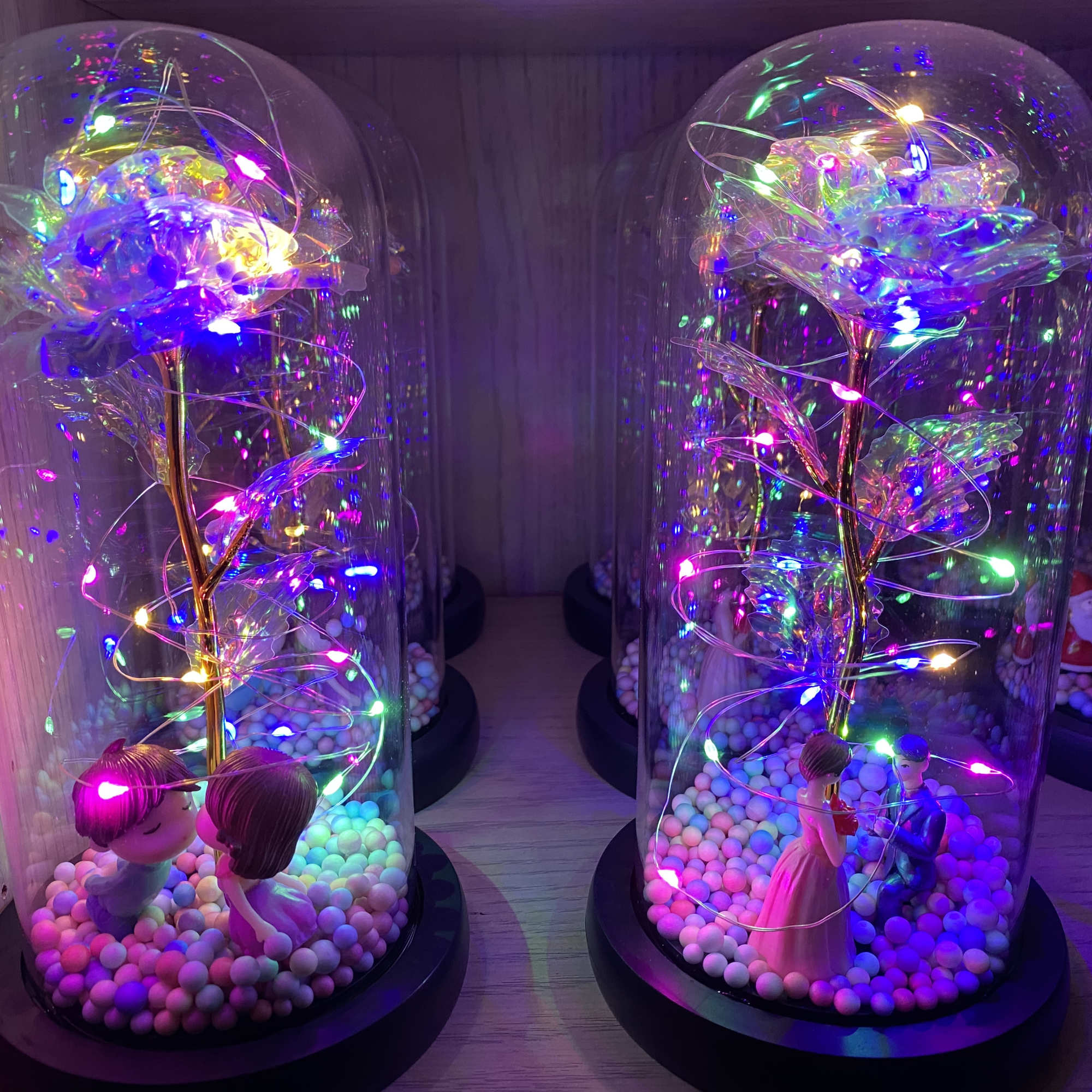 Beautiful artificial roses that are wrapped around LED lights in your choice