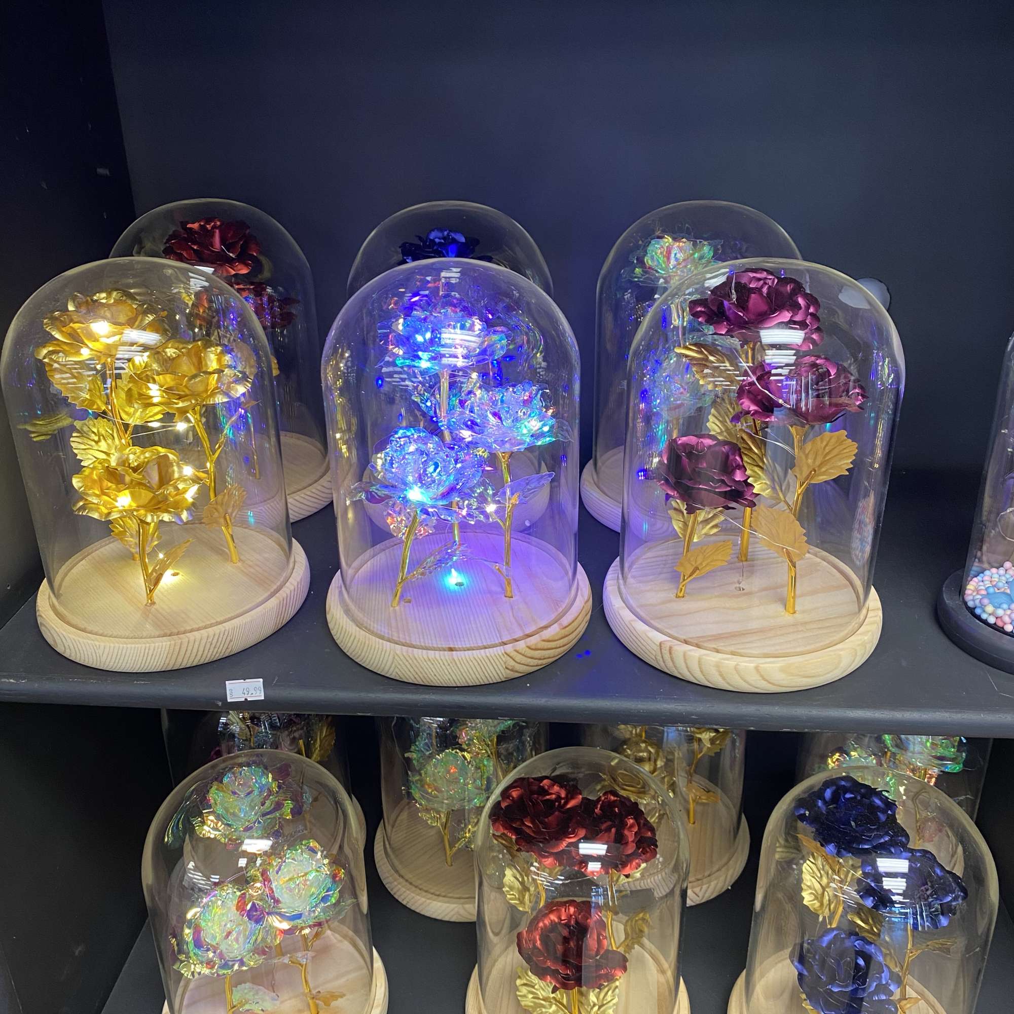 Beautiful artificial roses that are wrapped around LED lights in your choice