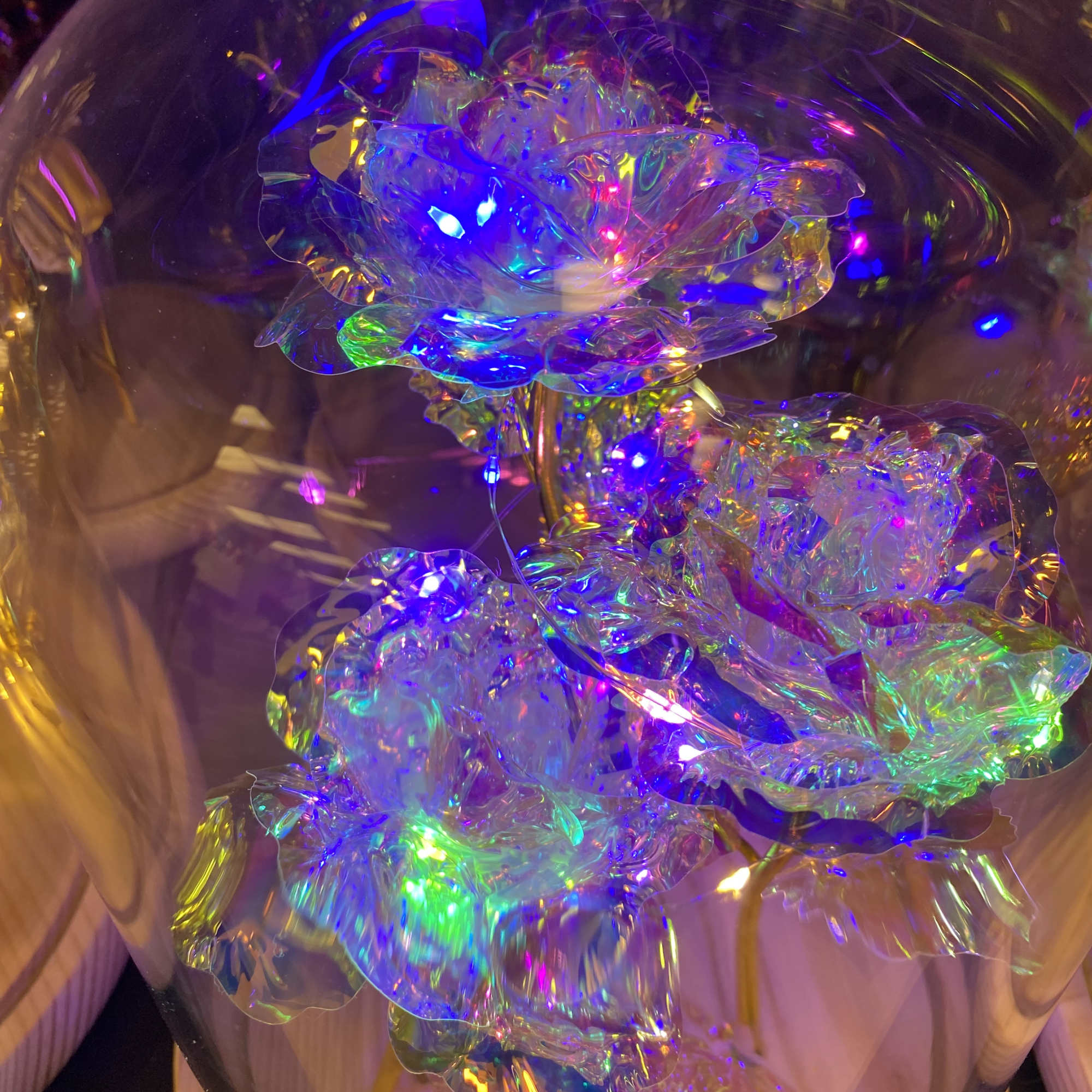 Beautiful artificial roses that are wrapped around LED lights in your choice