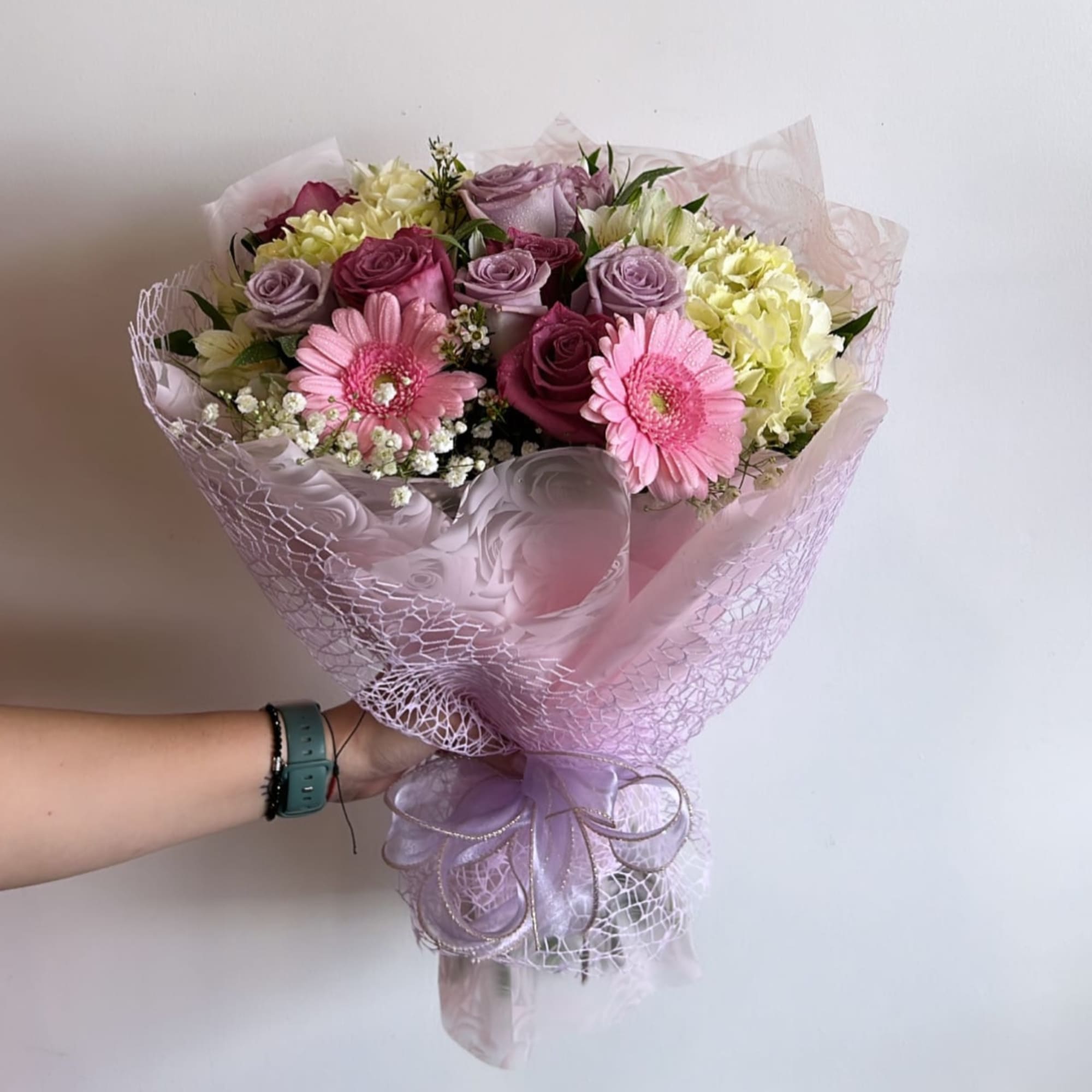 bouquets are never identical, but will have the same overall theme, wrapping bouquets are never identical, but will have the same overall theme, wrapping