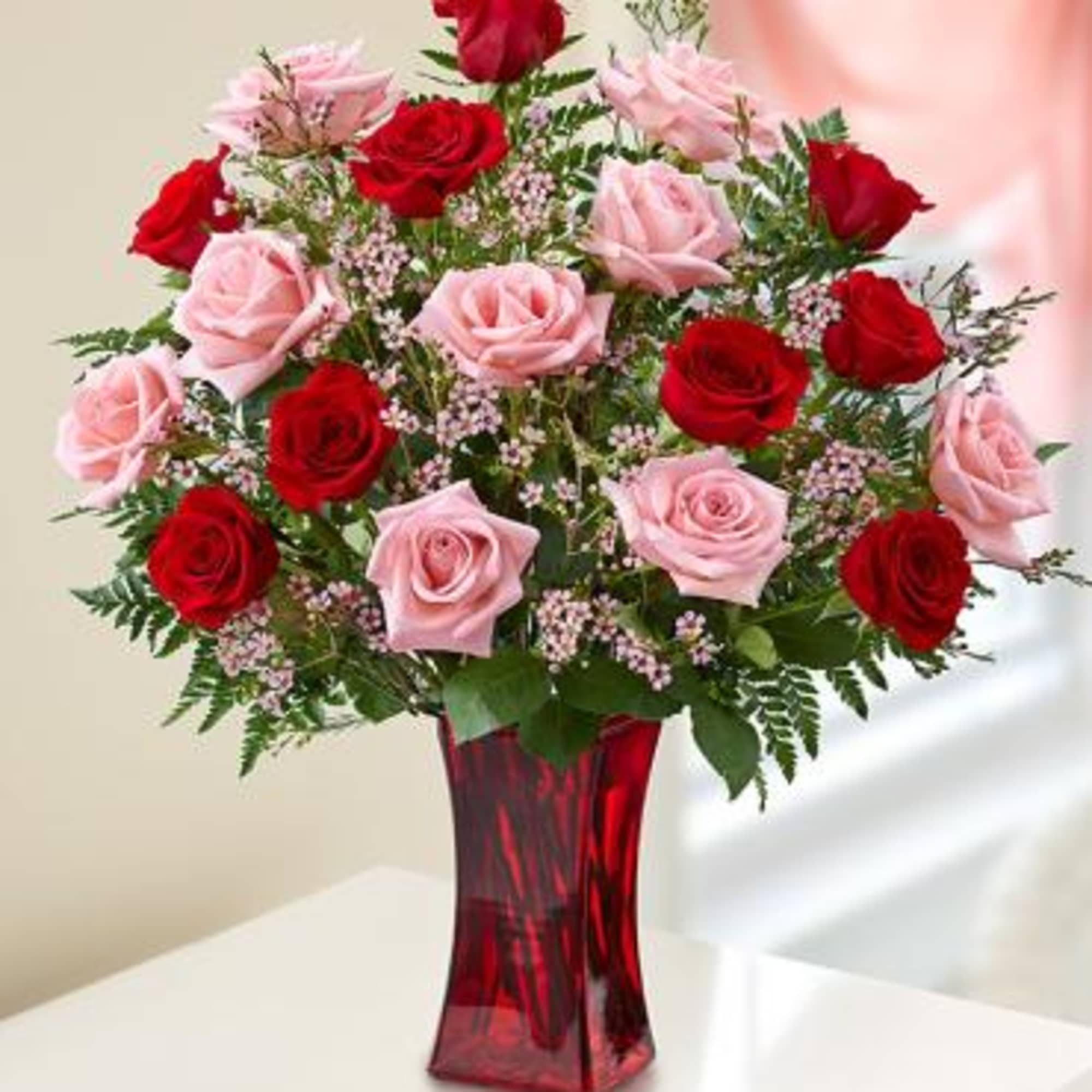 Take pink roses, symbolizing grace, elegance and appreciation. Add red roses, for 
Take pink roses, symbolizing grace, elegance and appreciation. Add red roses, for