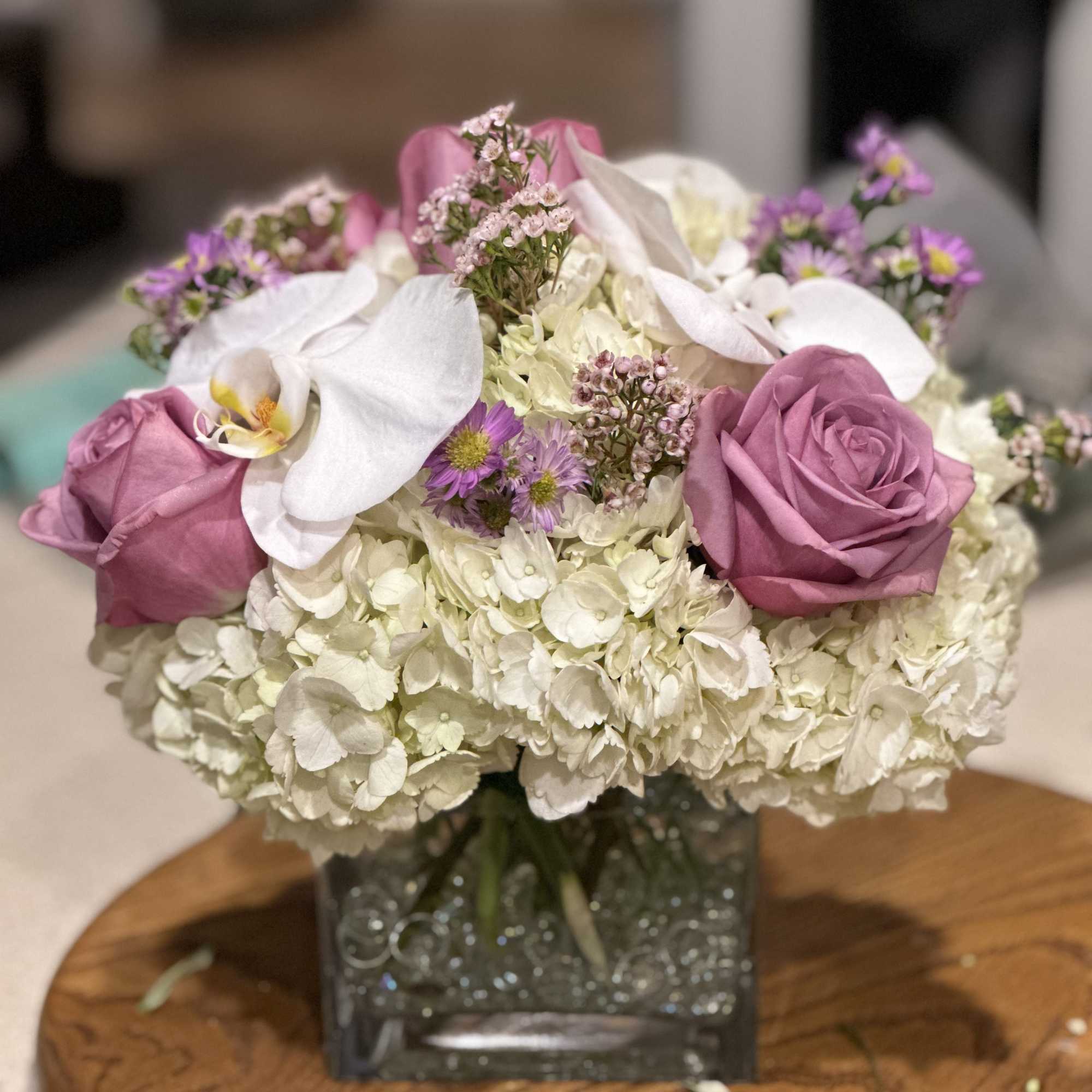 Our most popular arrangement! Pop of Lavender by BloomNation&trade; is the perfect