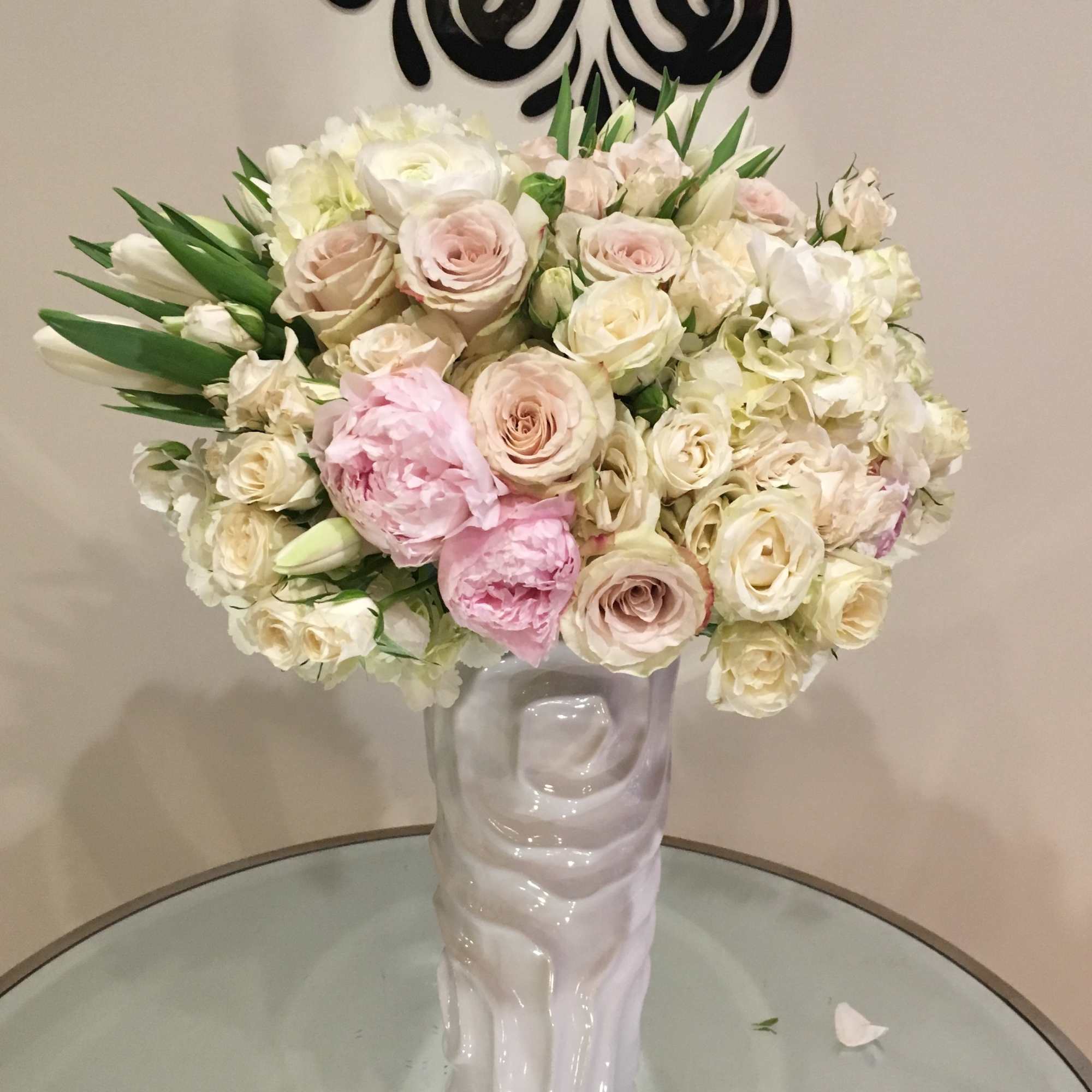 roses, tulips, peonies and hydrangea
Each arrangement recreated this item description will not