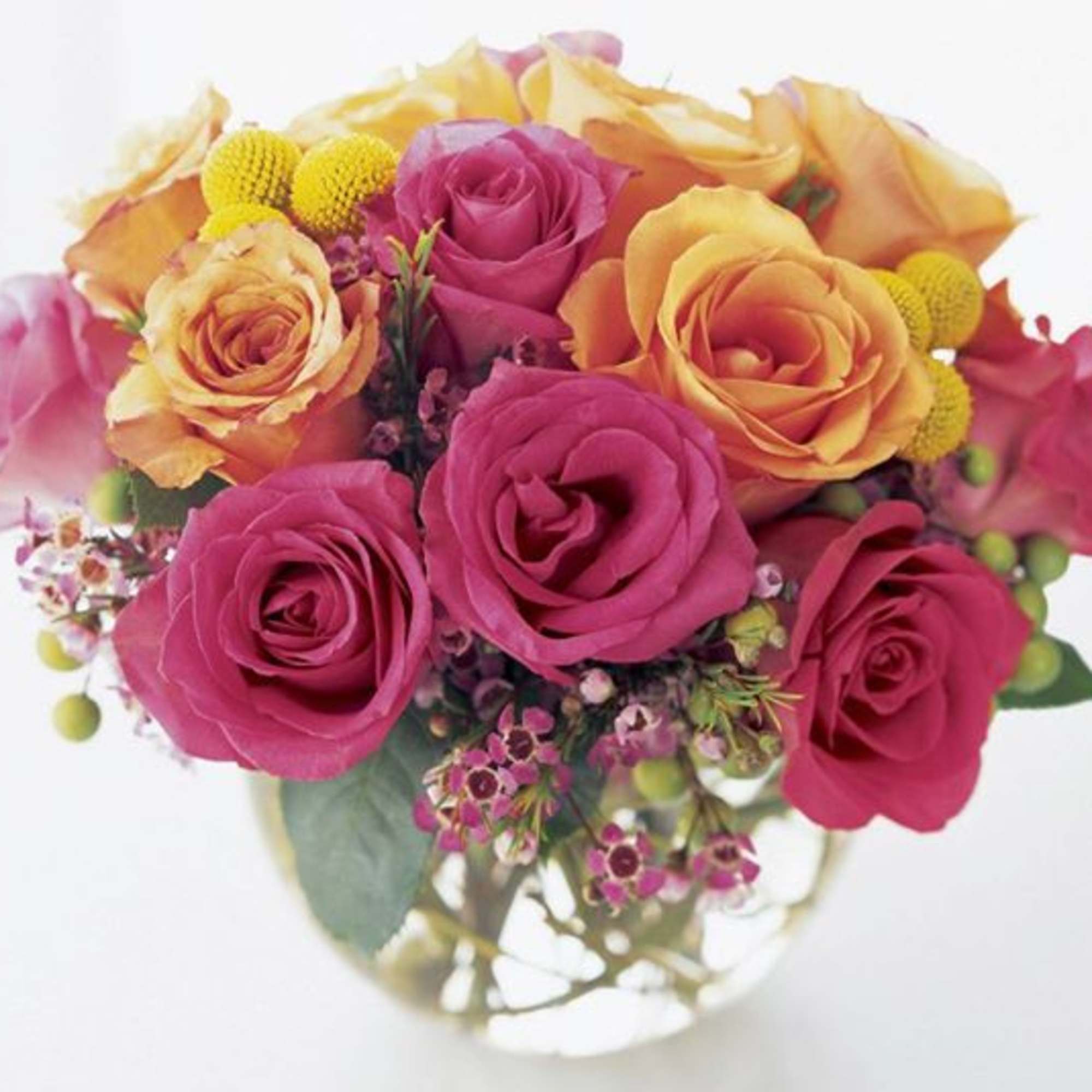 One Dozen of Our Bowl has Exquisite Pink Roses, Yellow Roses, Wax