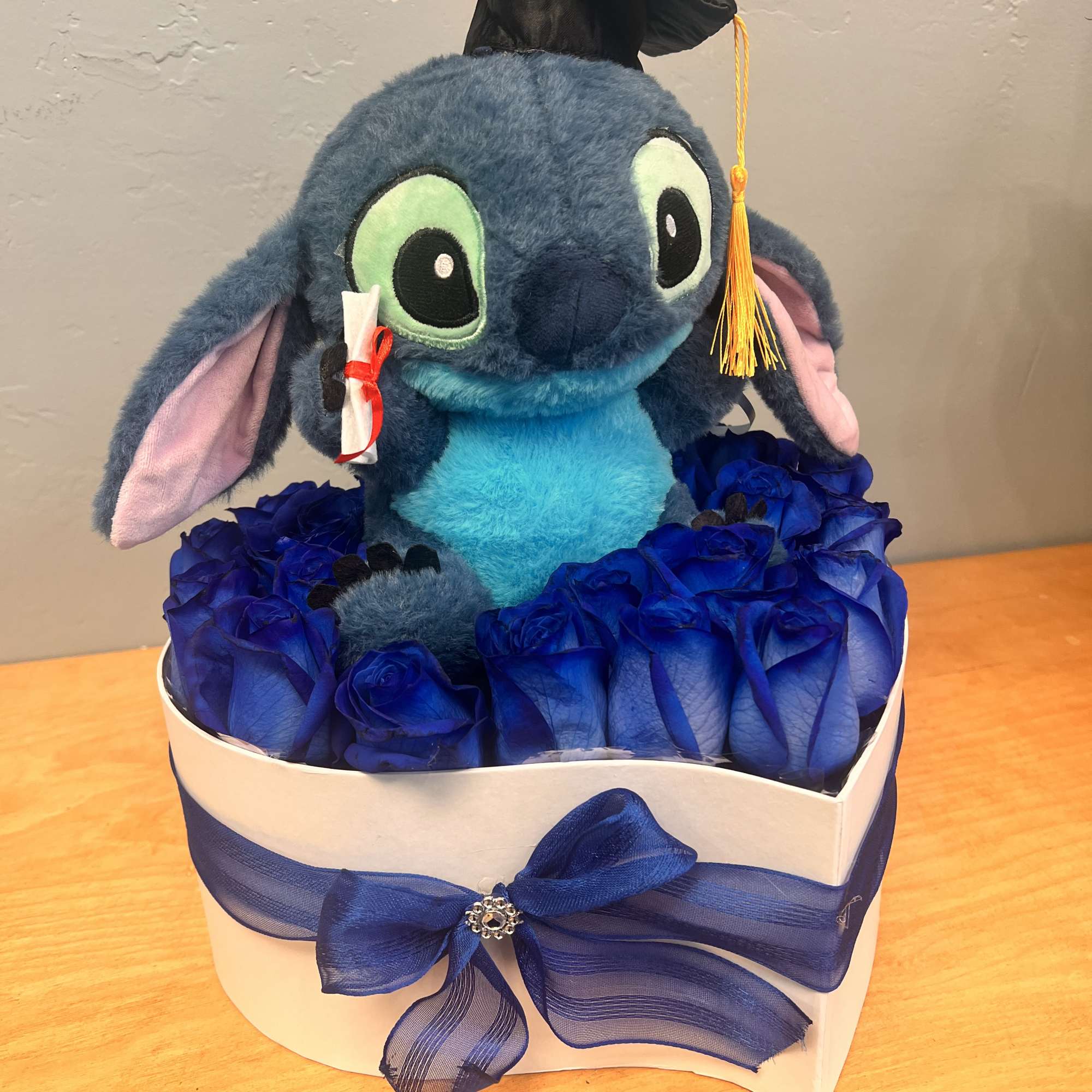 Graduation Stitch with blue vibrant roses. Graduation Stitch with blue vibrant roses.