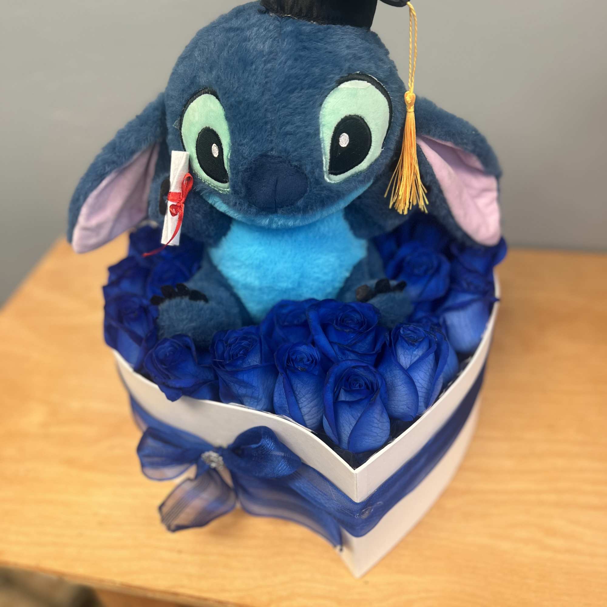 Graduation Stitch with blue vibrant roses. Graduation Stitch with blue vibrant roses.