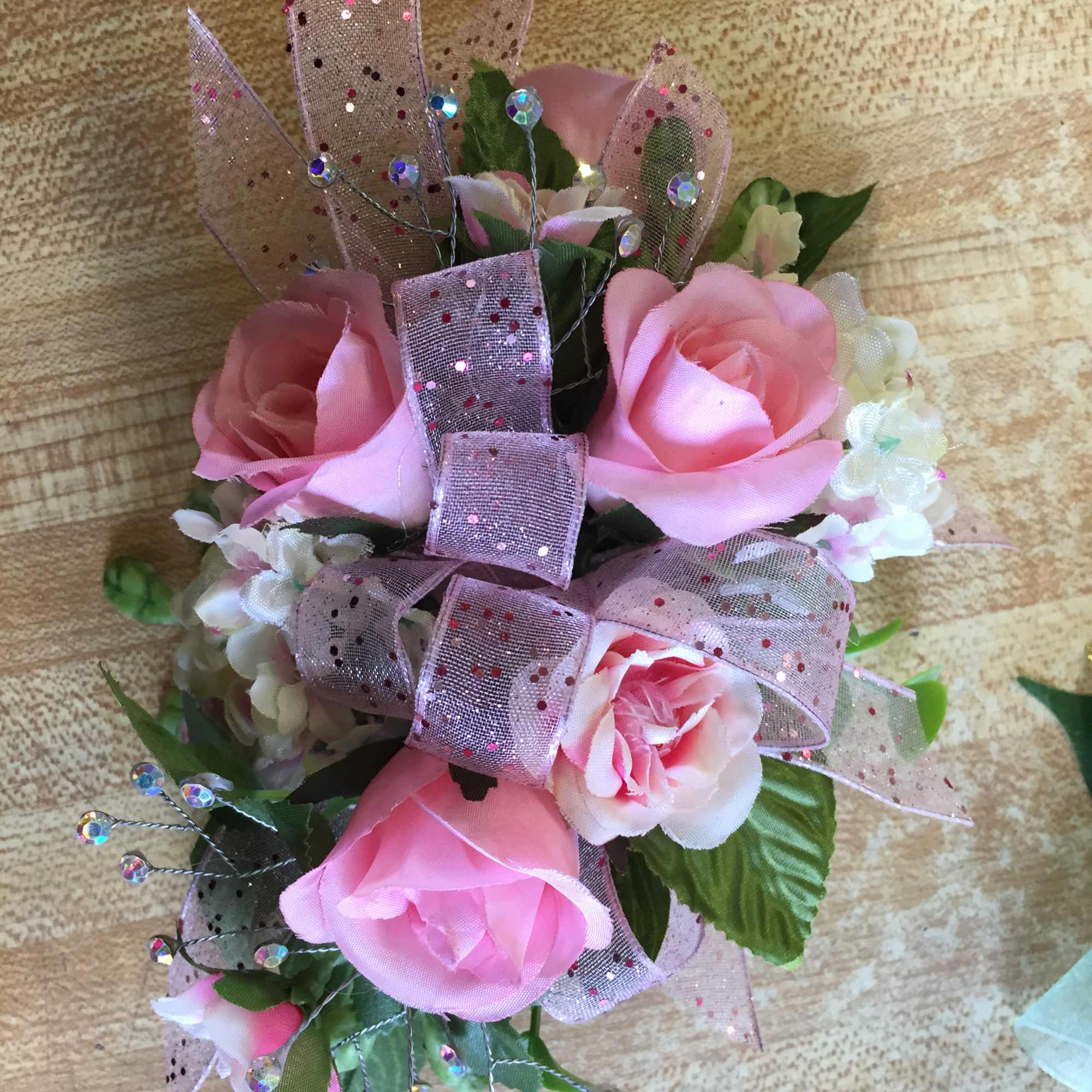 Pink Spray Roses, Rhinestones, Ribbons, Small white accent flower & Greenery all Pink Spray Roses, Rhinestones, Ribbons, Small white accent flower & Greenery all