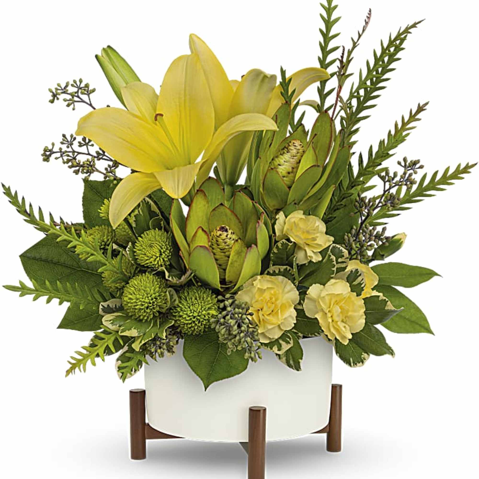 Let the sun shine in! This artistic arrangement of radiant lilies and