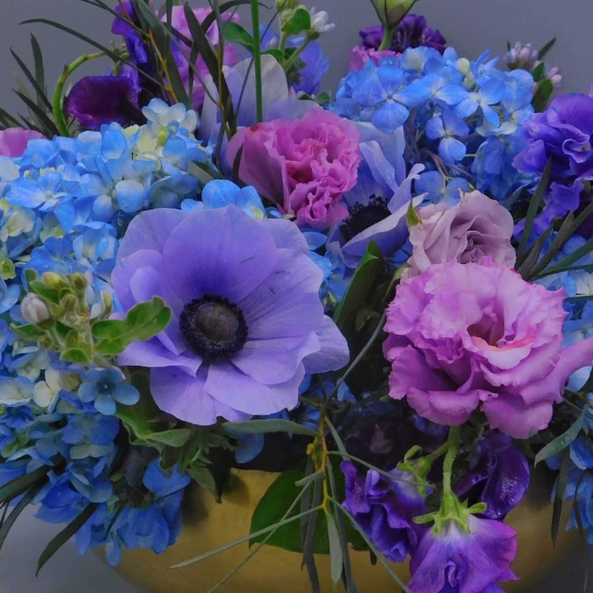 This Sweet and romantic blue flowers arragemet is the perfect gift for