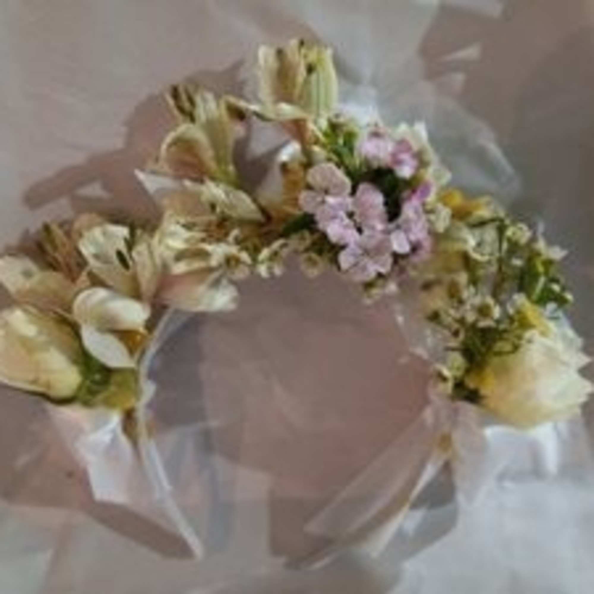 Bridal bouquet $65.00, bridesmaids bouquets 4 @ &amp;45.00 2 flower girls tiaras