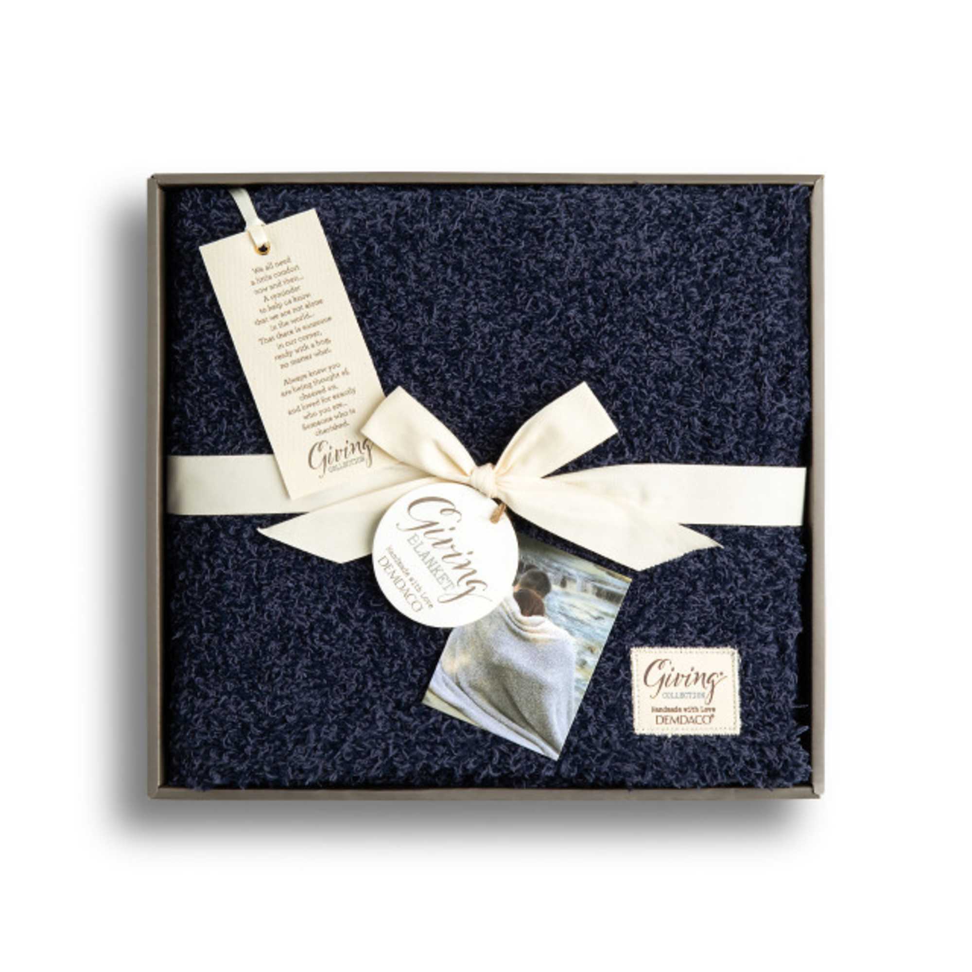 Snuggle up with the purposeful Navy Giving Blanket from the Giving Accessories Snuggle up with the purposeful Navy Giving Blanket from the Giving Accessories
