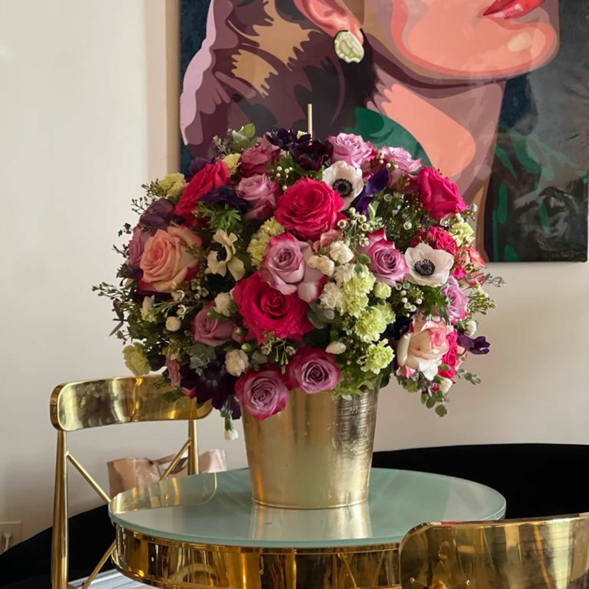 Anemones, Pink Roses, mini carnations, eucalyptus , foliage and golden base