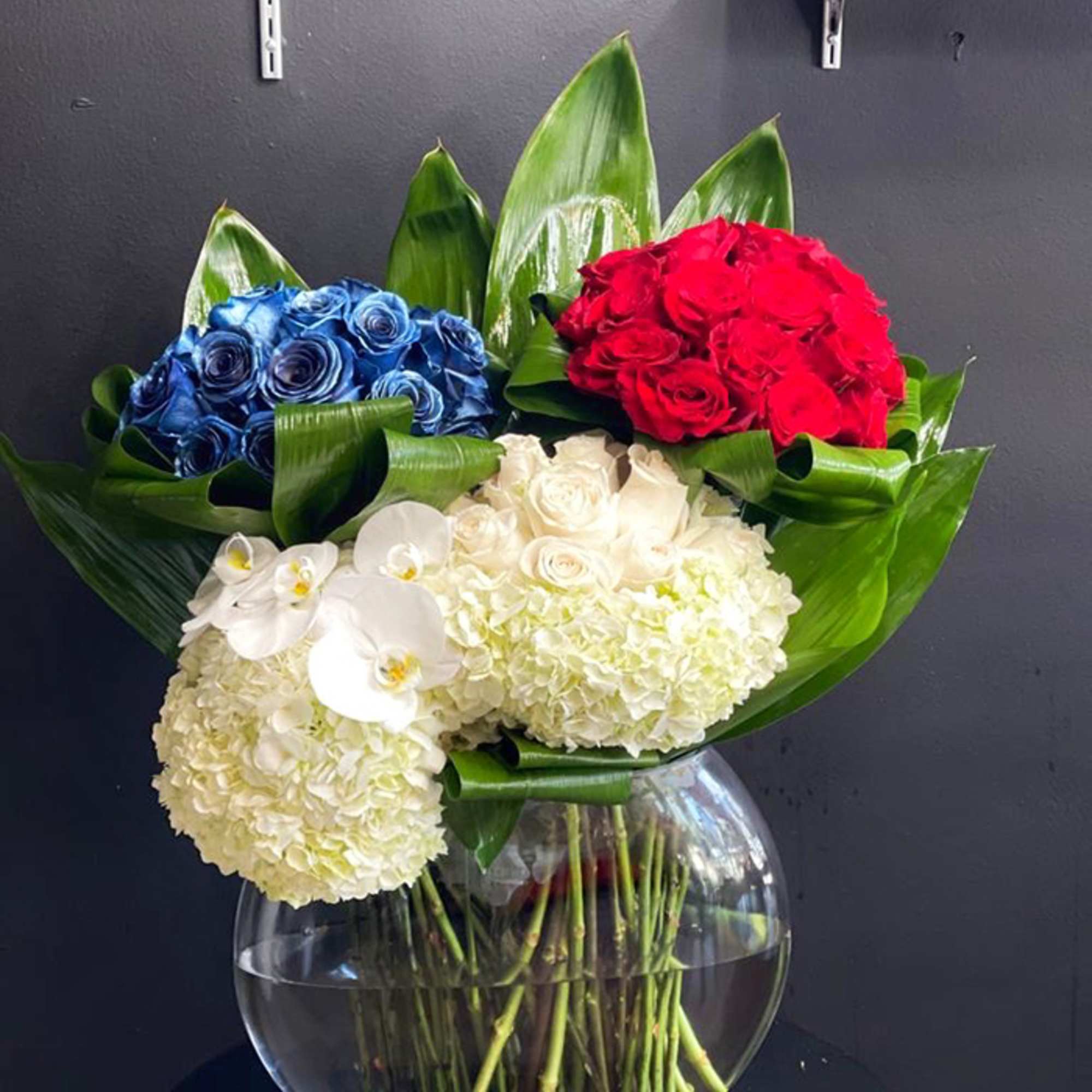 White, Blue and Red Roses, Hydrangeas, Green Foliage, Fish Bowl