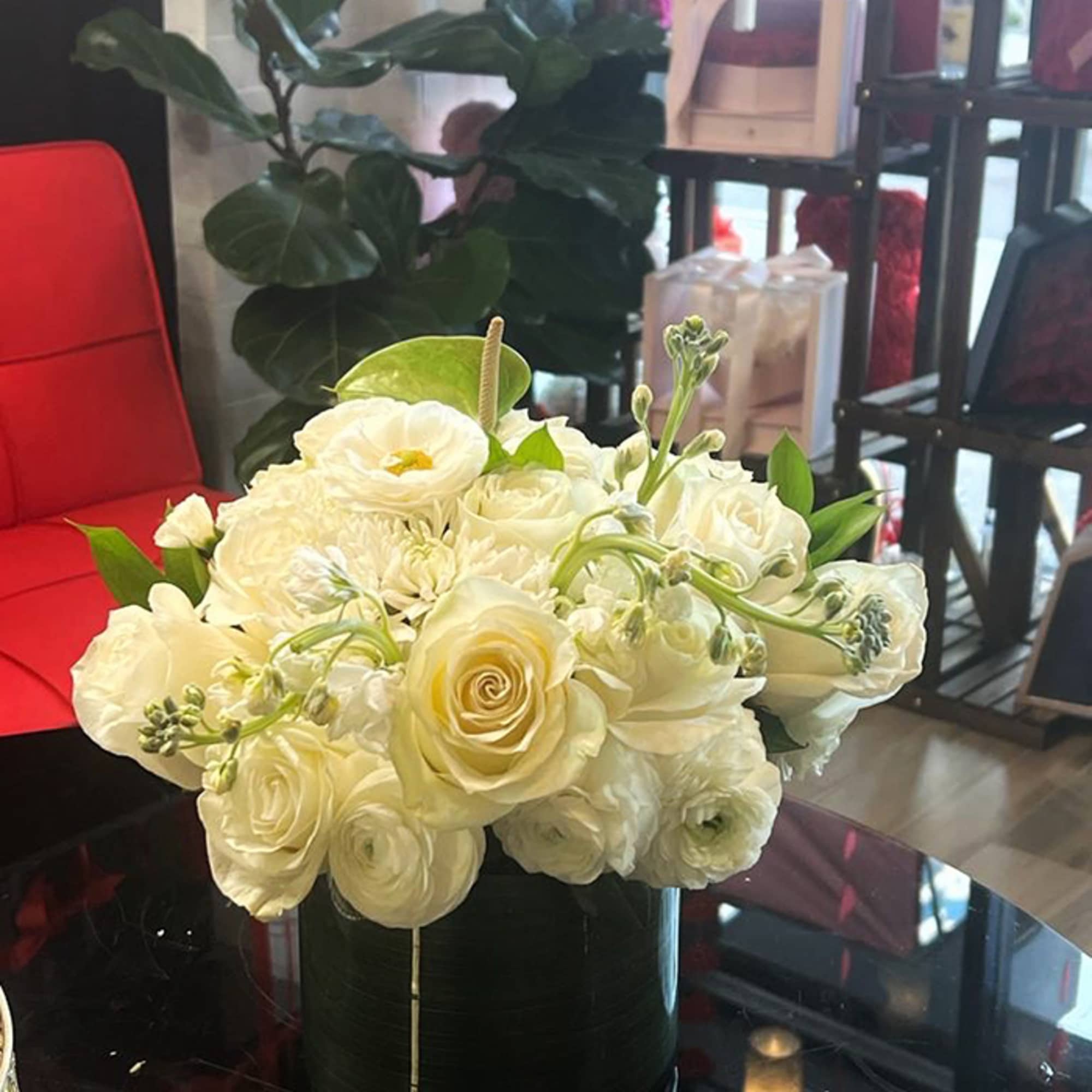 Clear Vase with Mixed Flowers.