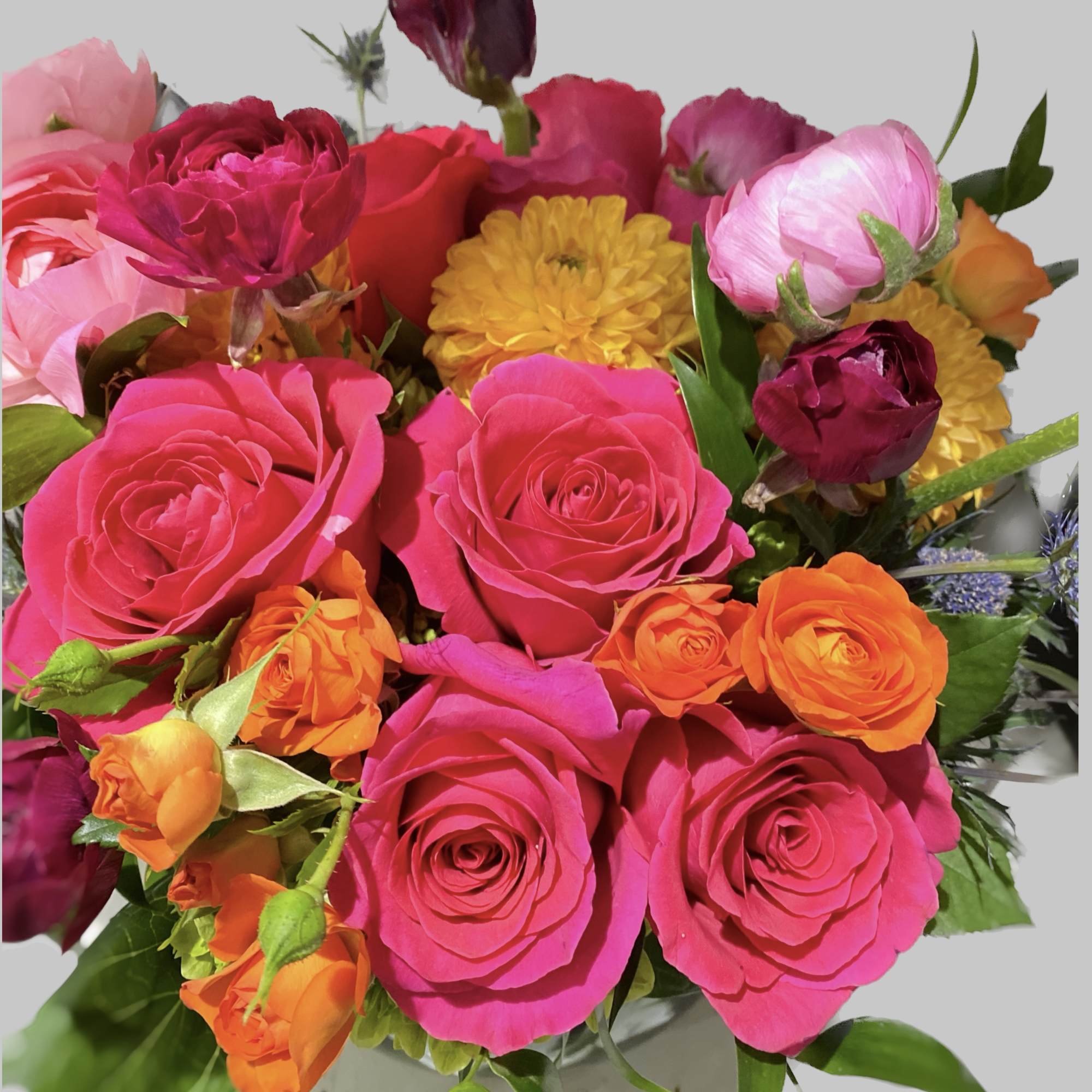 A full-color explosion, This arrangement is a beautiful gift for anybody you
