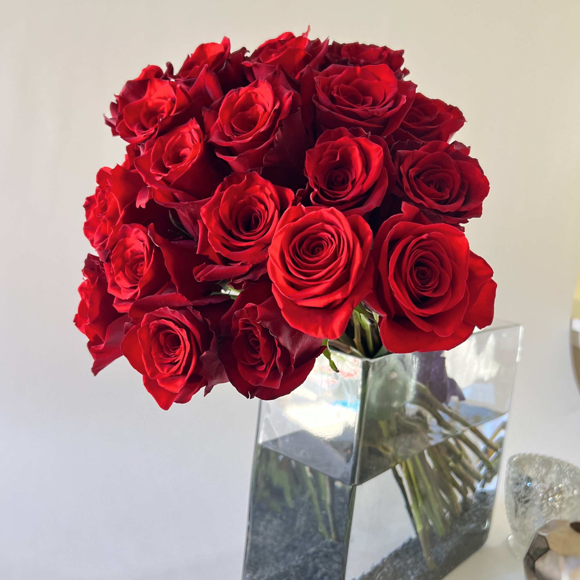 Beautiful red roses bouquet with purple vanda orchid  in a Modern