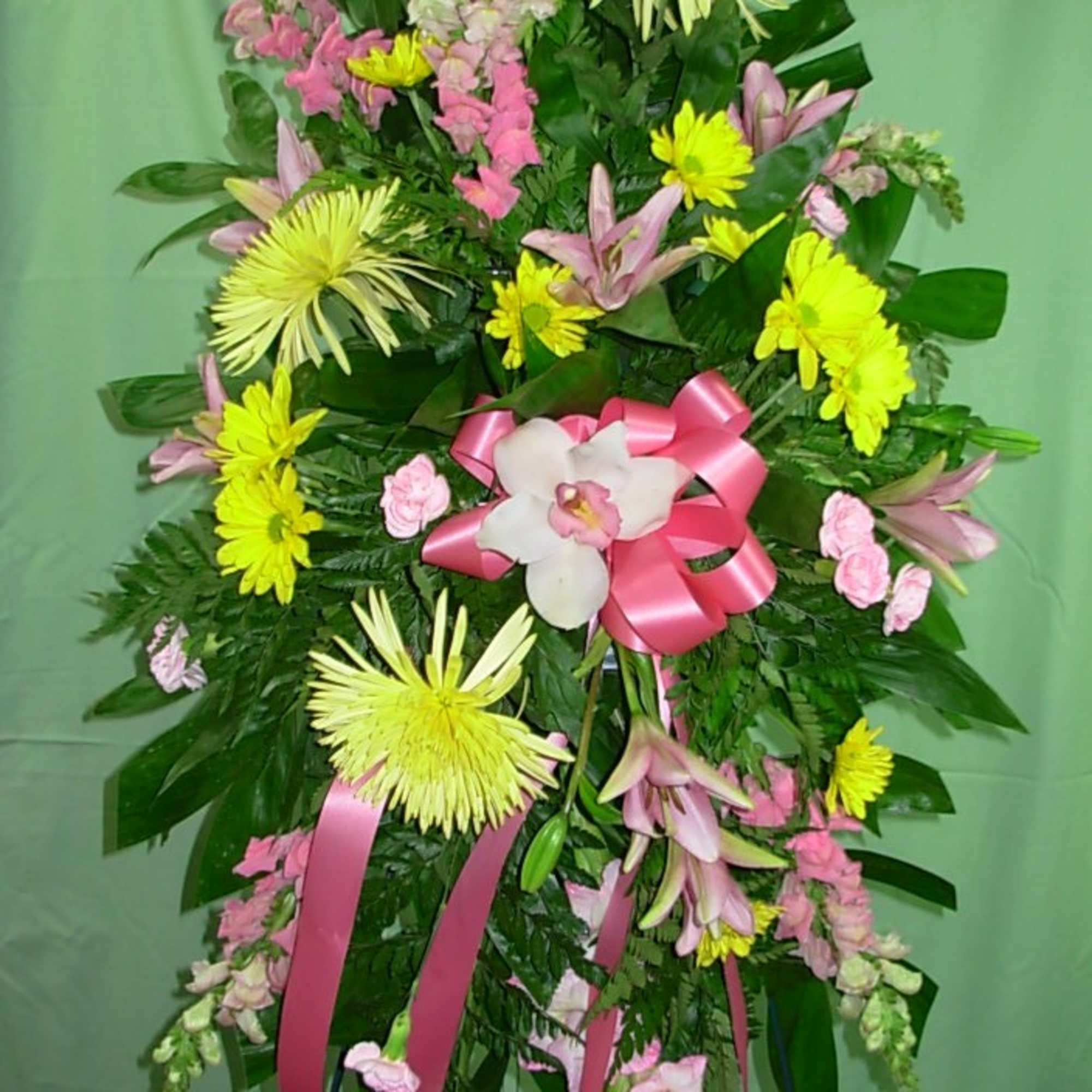 This PINK and YELLOW STANDING SPRAY  is made of pink snapdragons