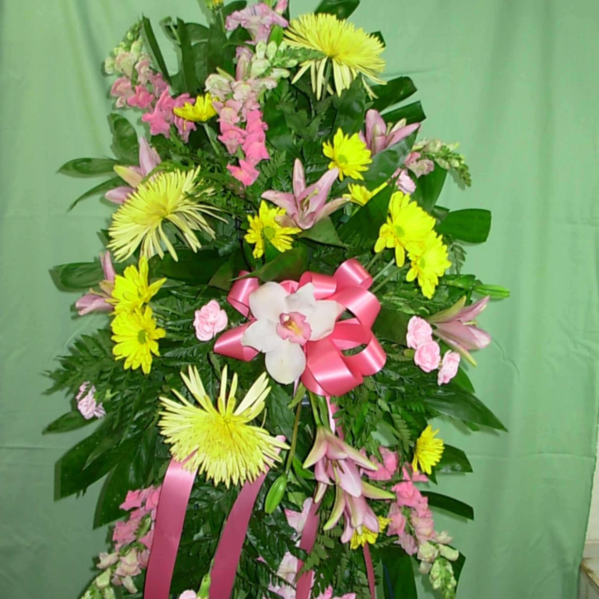 This PINK and YELLOW STANDING SPRAY  is made of pink snapdragons