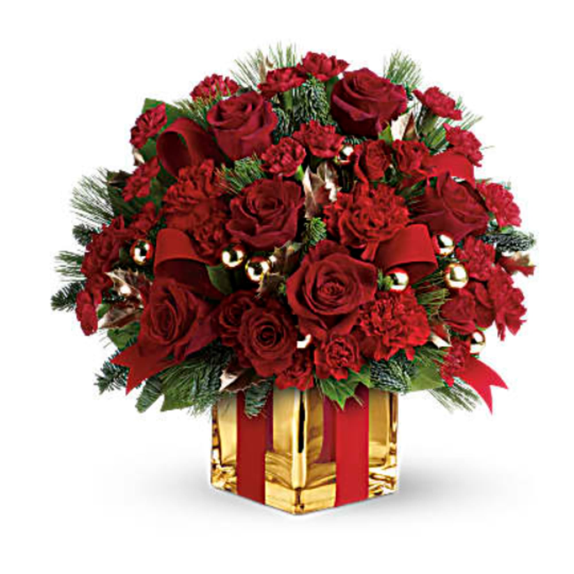 Lush red roses, fresh winter greens and a festive, gold mirrored glass Lush red roses, fresh winter greens and a festive, gold mirrored glass