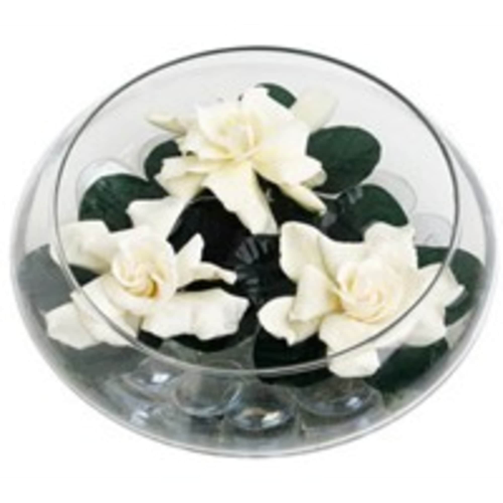 Three Gardenias in a bowl with submerged stones inside vase
