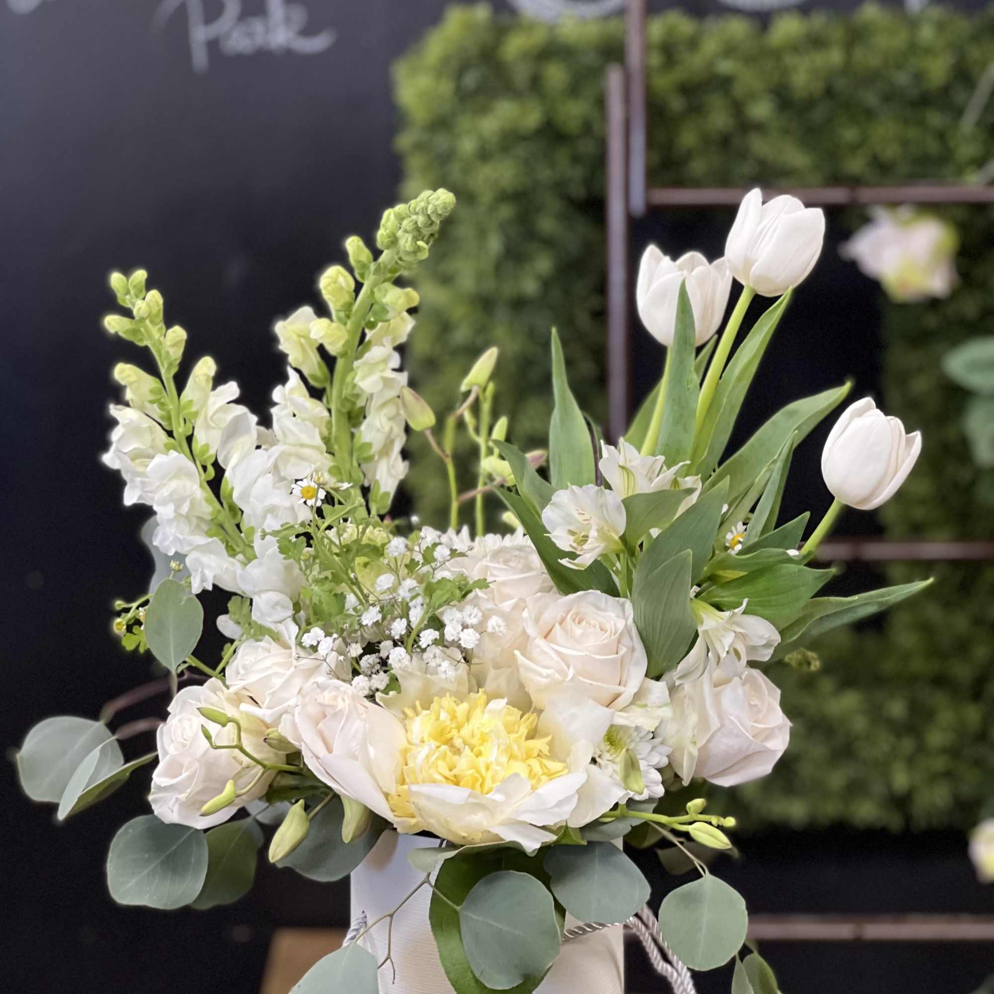 Mixture of white flowers in Floral Foams structured Container perfect gift for