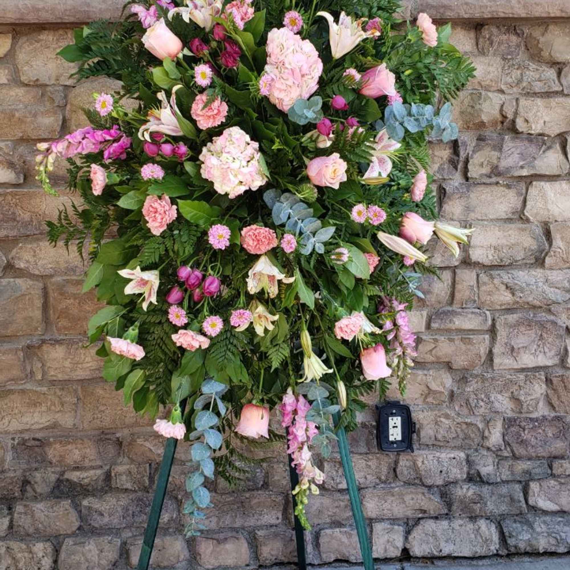 12 pink roses, 8 pink carnation, 4 stems of pink Asiatic lily